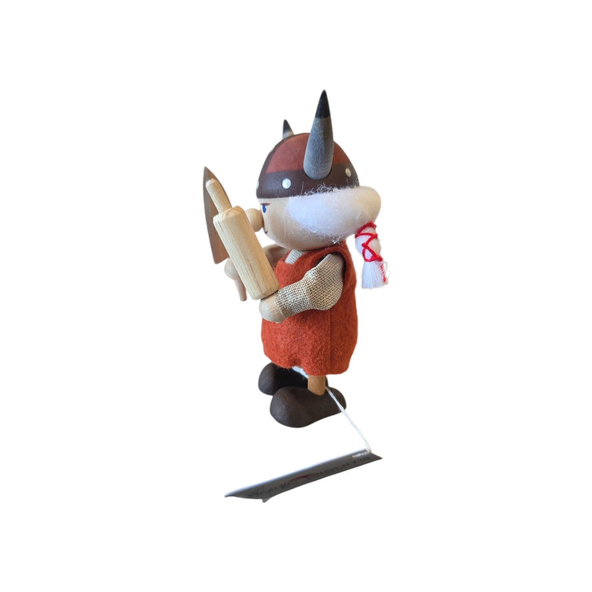Viking woman gnome figurine wearing a horned helmet and holding a wooden rolling pin.