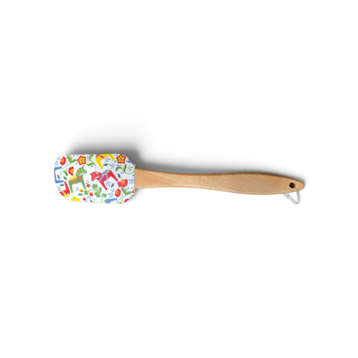 Silicone spatula with a wooden handle and a white head featuring a colorful Swedish Dala horse and floral pattern.