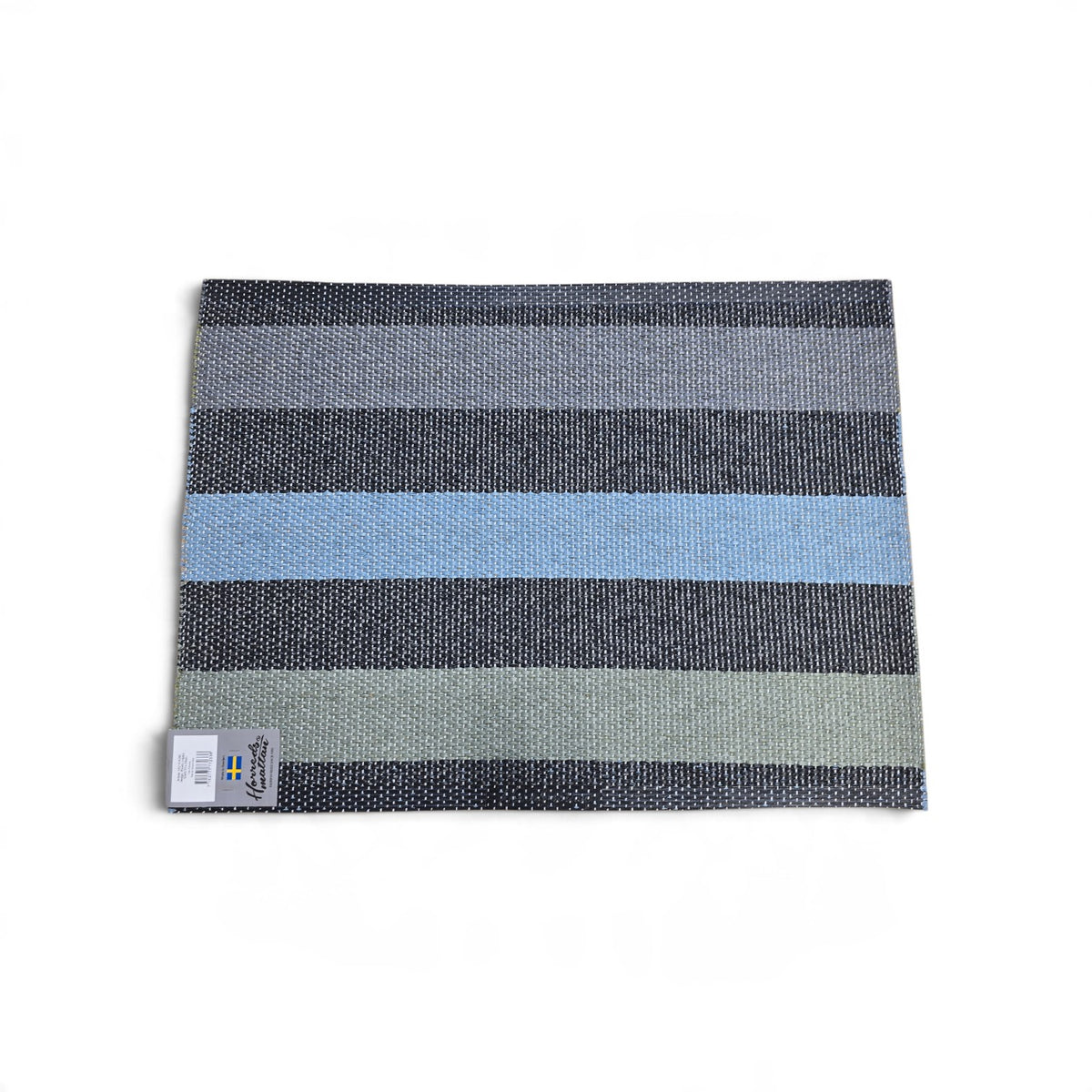Rectangular woven vinyl rug with horizontal gray, black, and light blue stripes and a small Swedish flag tag.