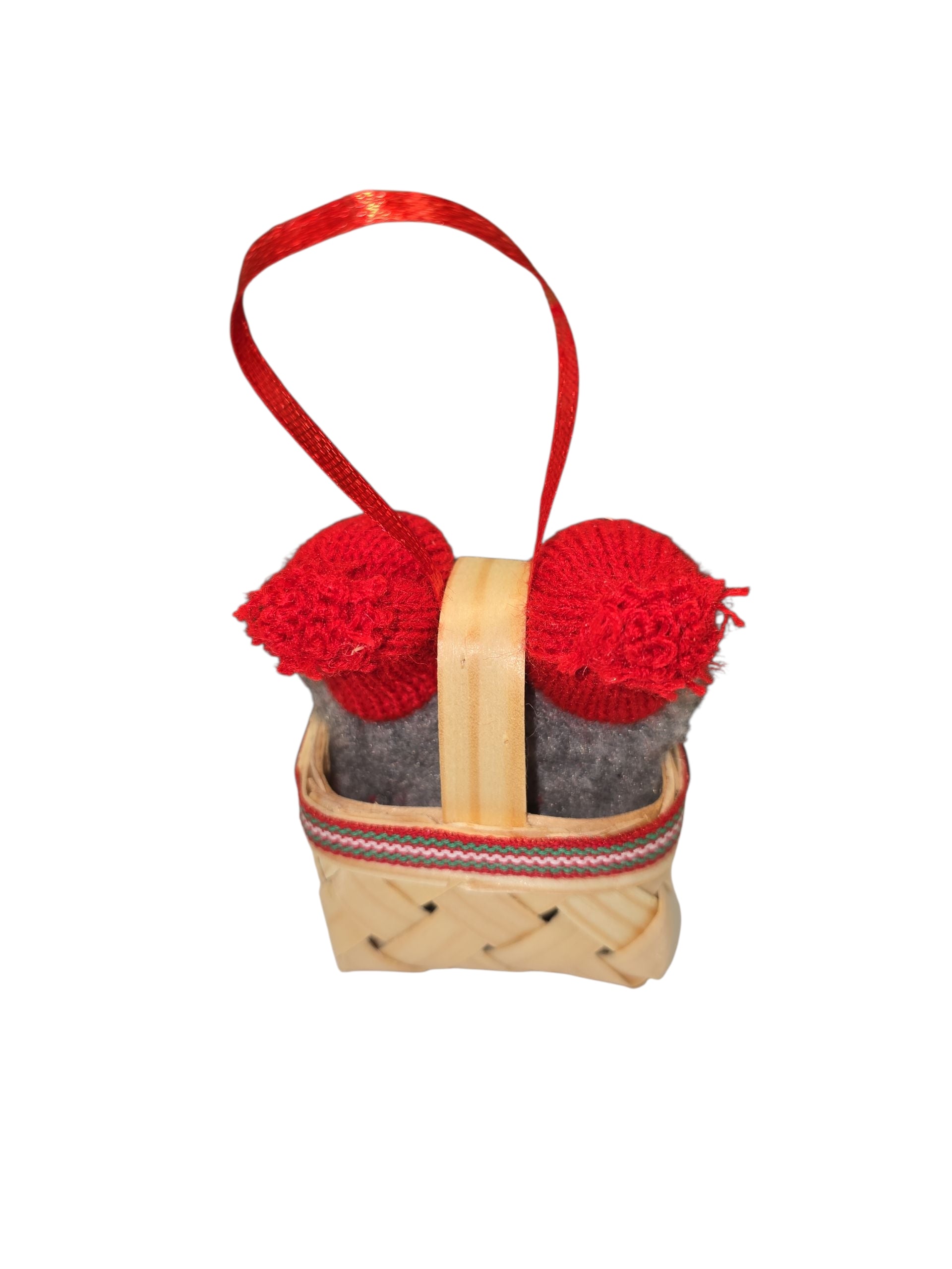 Ornament: Swedish Santa Figurines in a Basket—two gray figurines with red knit hats and handle, arranged in a small woven basket with a ribbon, evoke handmade Christmas decor inspired by Swedish tradition, shown on a white background.