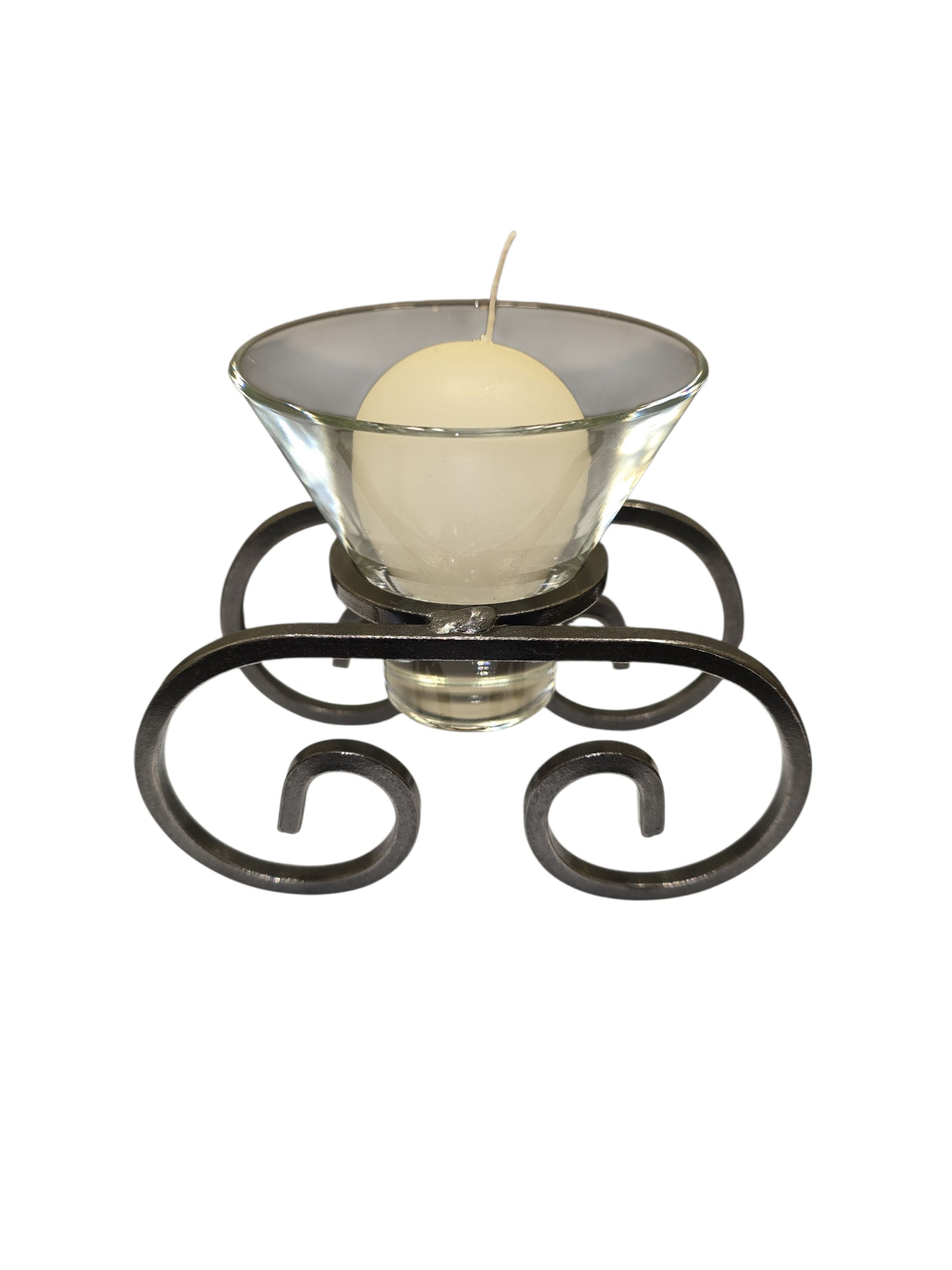 The Logum Kloster Lys 2.5" Ball Candles (4 Pack) feature round white candles in glass holders on a black metal stand with decorative scrollwork—ideal for bringing classic Scandinavian style to your home.