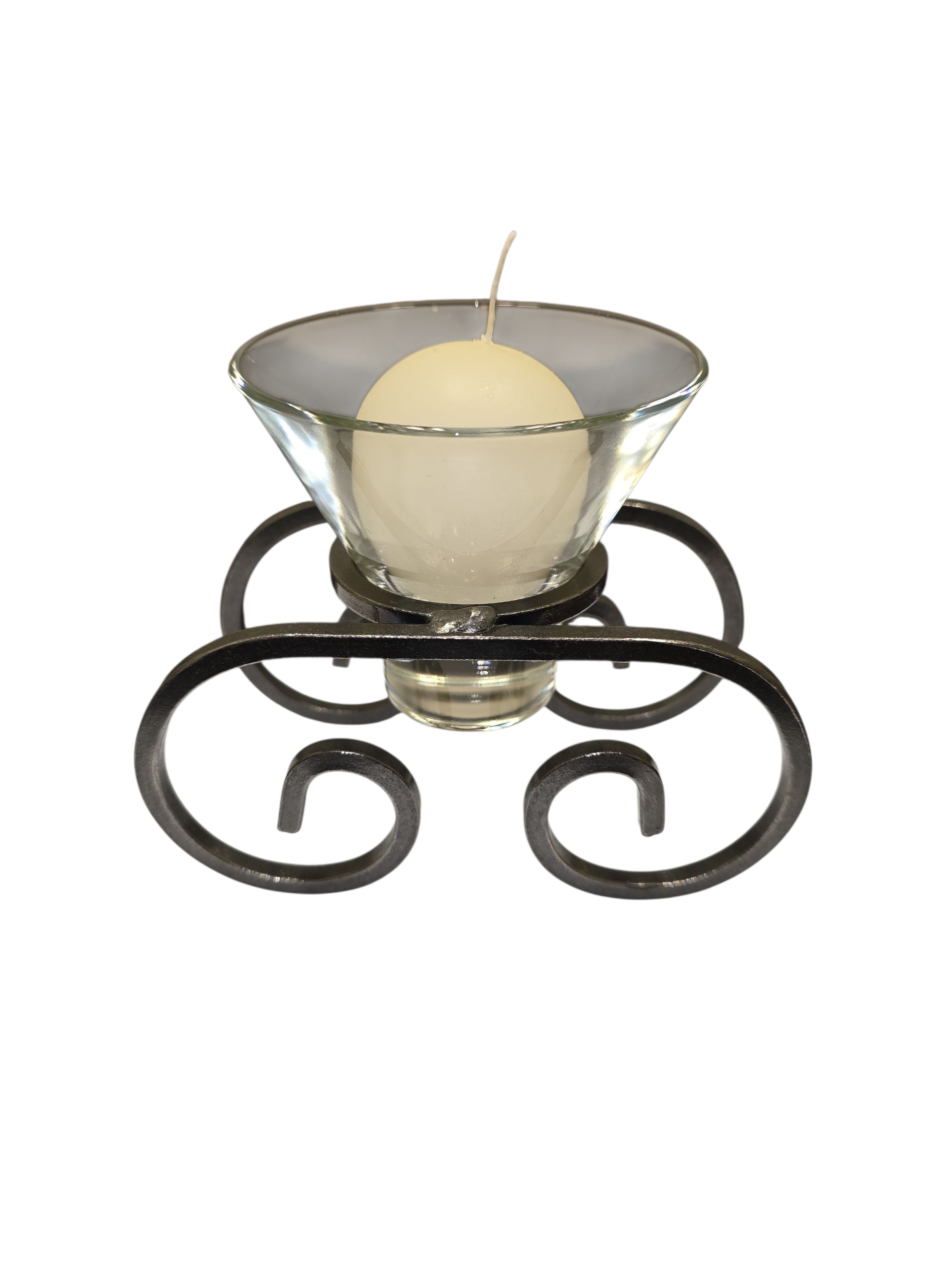 The Logum Kloster Lys 2.5" Ball Candles (4 Pack) feature round white candles in glass holders on a black metal stand with decorative scrollwork—ideal for bringing classic Scandinavian style to your home.
