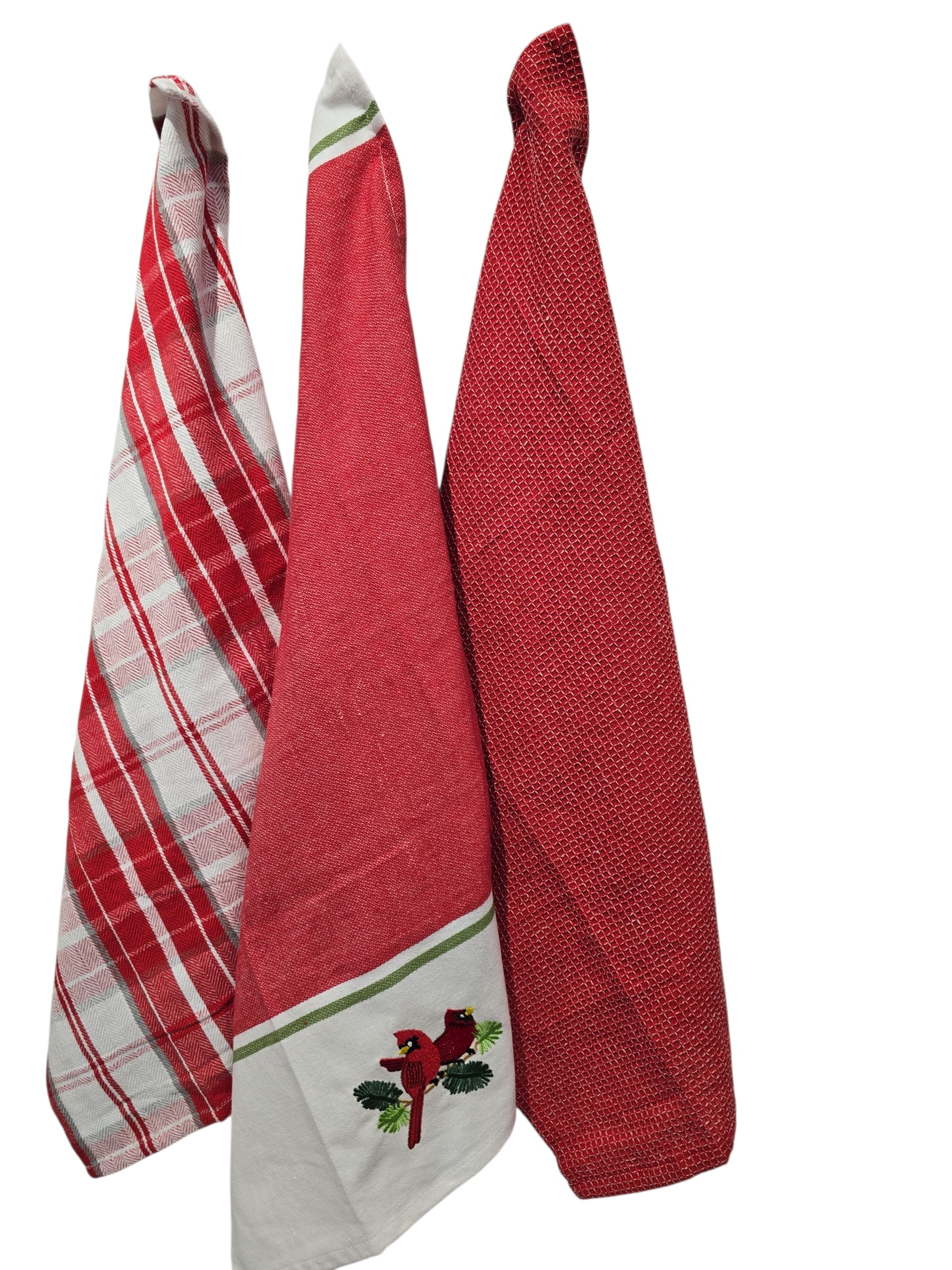 The Tea Towel: Cardinal Set of 3 Various Towels includes a red plaid towel, a cardinal bird embroidery towel, and a solid red textured towel—perfect festive accents for your holiday kitchen decor.