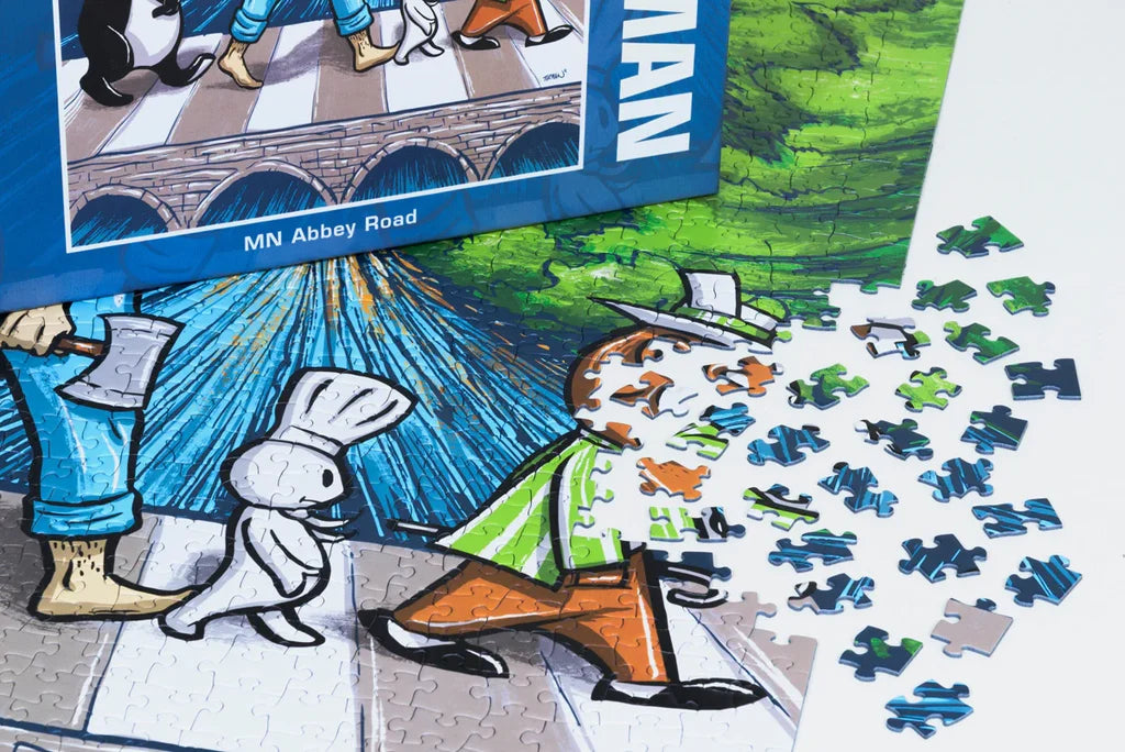 A colorful jigsaw puzzle with cartoon characters; some pieces are missing, exposing part of a man’s face dissolving into scattered puzzle pieces on a white background.