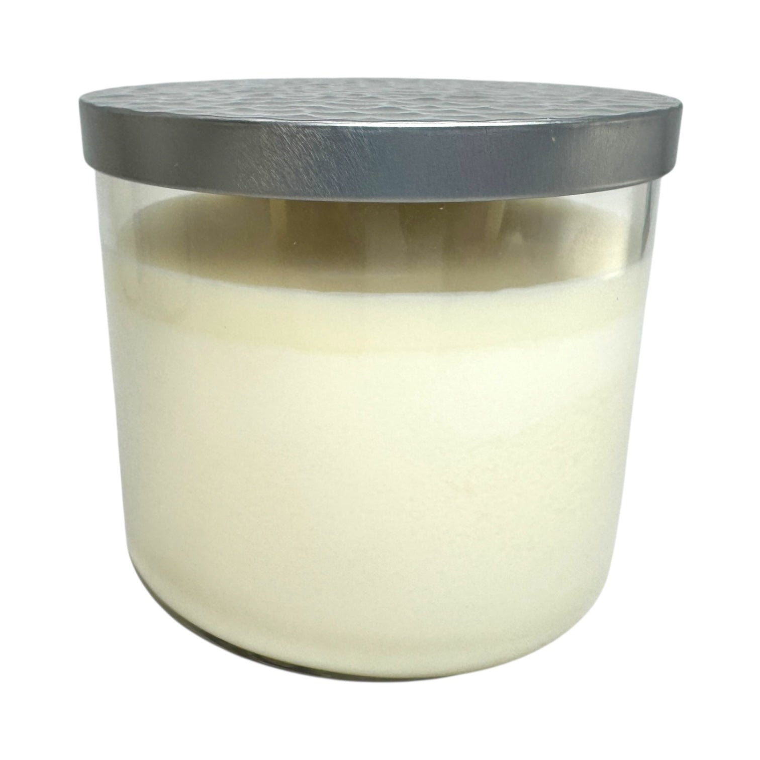 The Candle: Nordic Balsam - Winter Forest Candle features a clear glass jar with white soy blend wax and a metallic lid, making it the perfect festive Christmas candle.