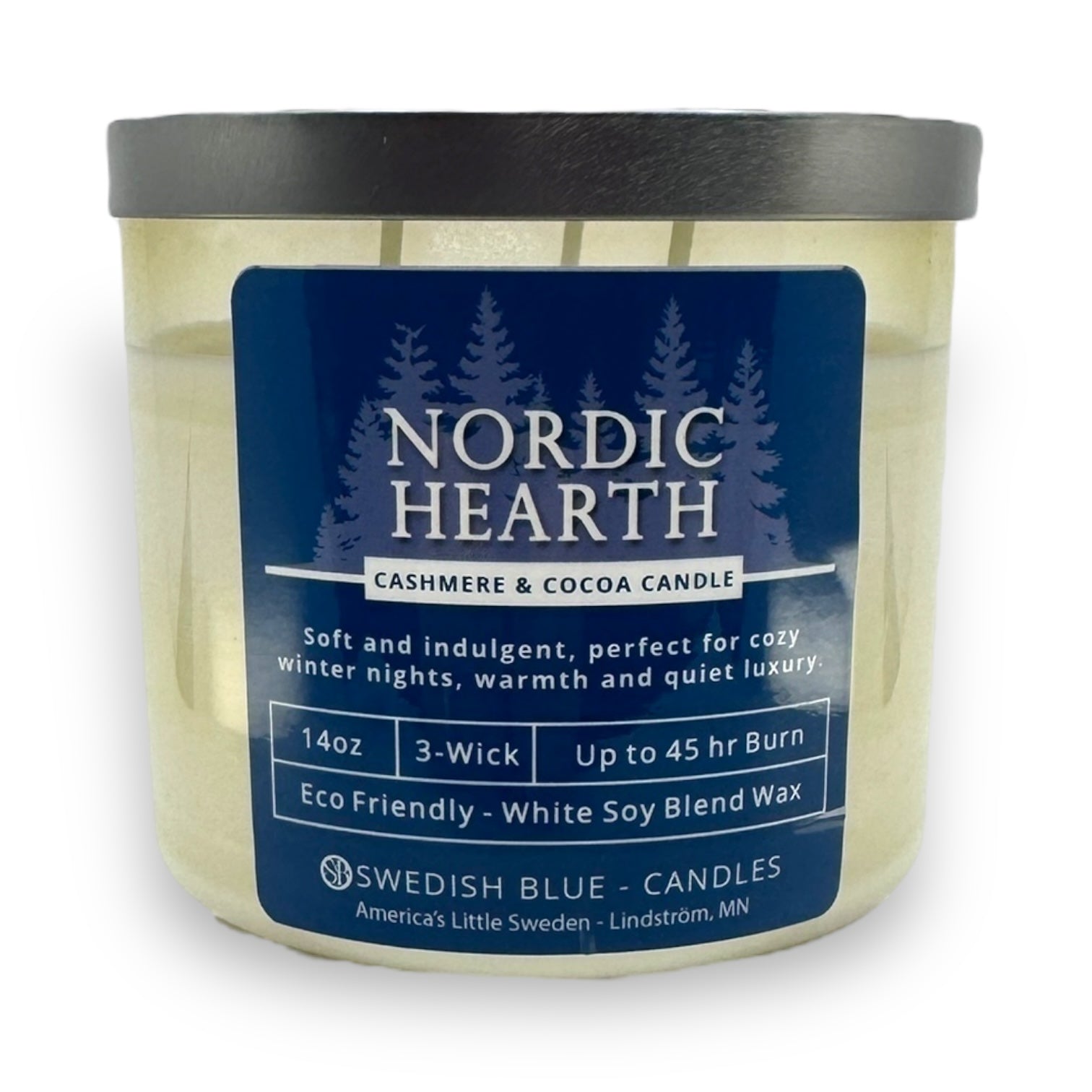 The Nordic Hearth – Cashmere & Cocoa Candle by Swedish Blue Candles is a 14oz, eco-friendly, 3-wick soy blend candle with white wax and up to 45 hours of burn time.