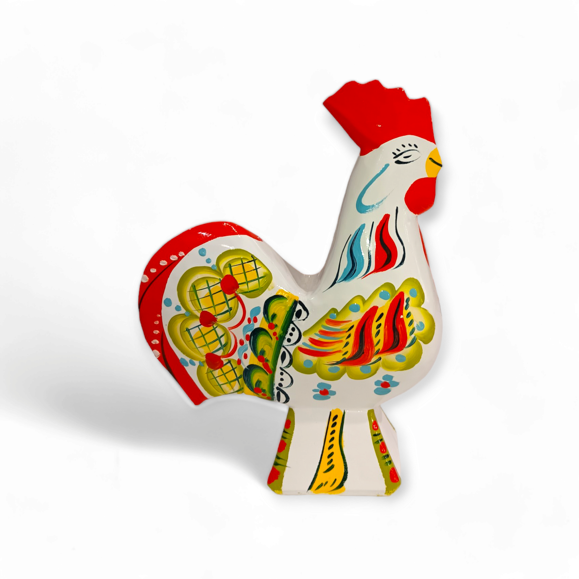 The Dala Rooster: White is a vibrant figurine featuring a red comb and detailed patterns, showcasing traditional Swedish handcraft against a white background.