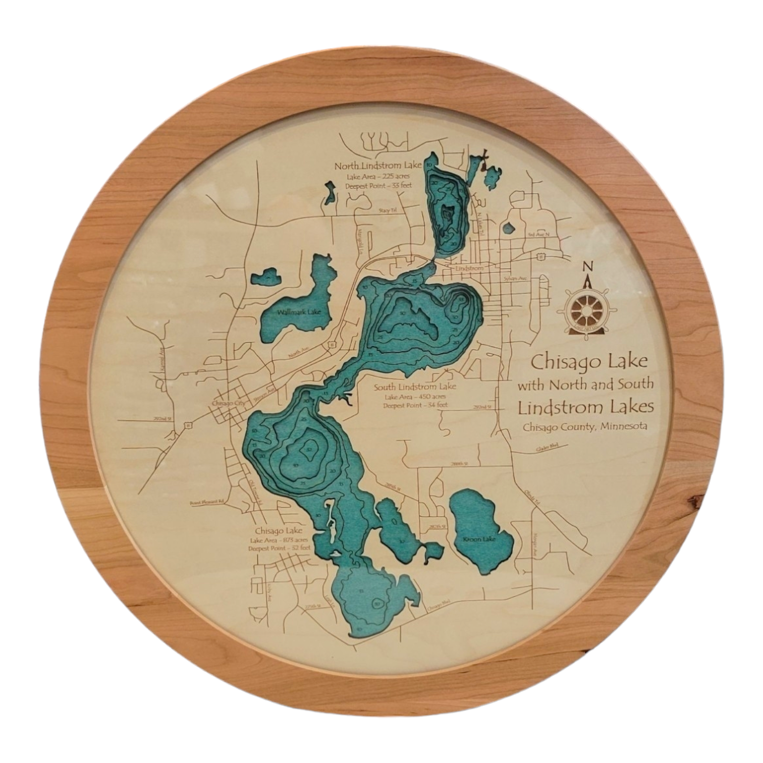 This 11x14 wooden Lake Map art intricately details Chisago Lake, featuring North & South Lindstrom Lakes and North Center Lake with personalized designs highlighting lake areas and roads in Chisago County, Minnesota.
