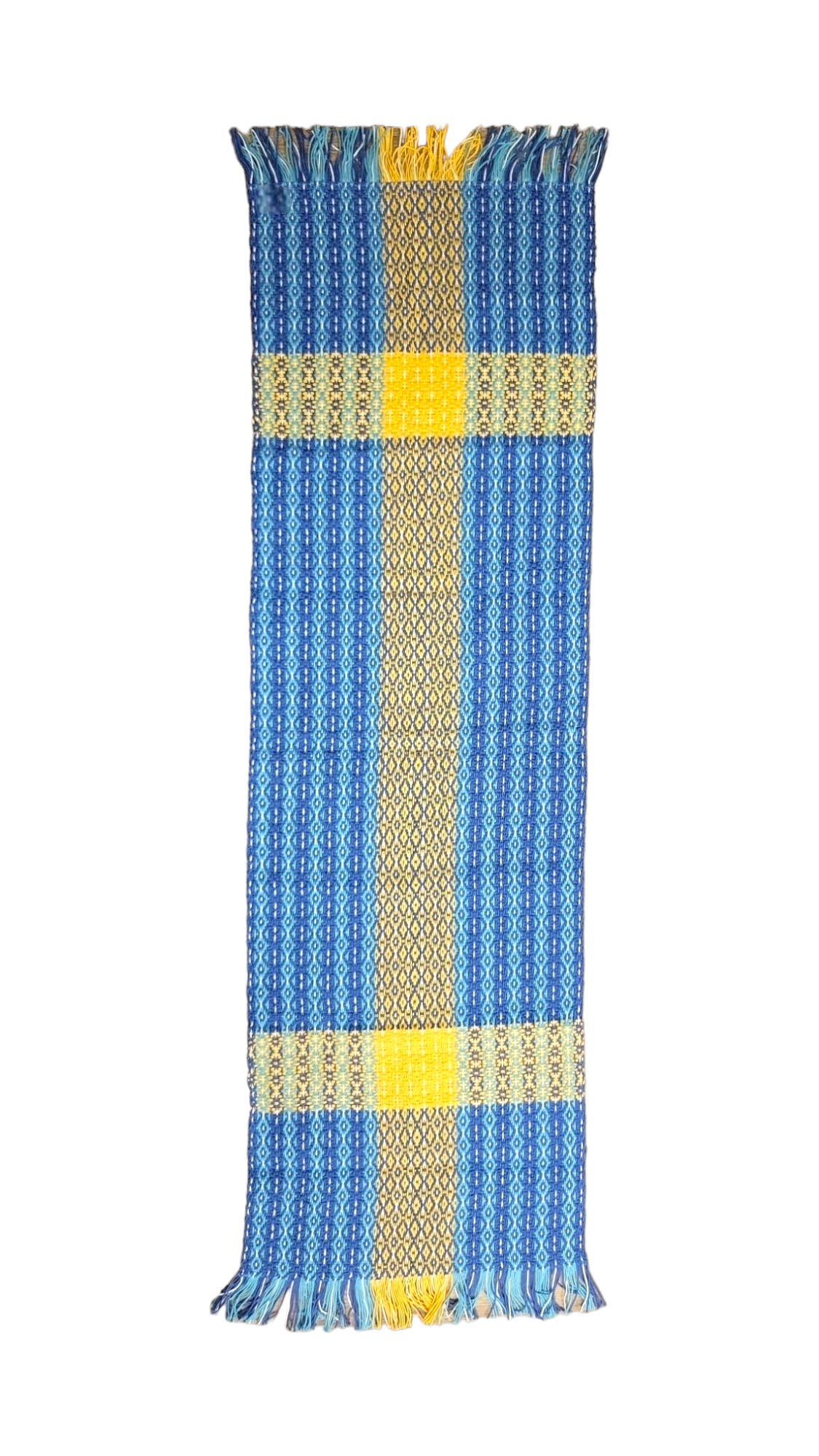 The Swedish Flag Runner is a hand-woven, 100% cotton rectangular runner (36-39) featuring blue, yellow, and white geometric patterns with fringed edges and a central yellow cross, crafted on an antique loom.