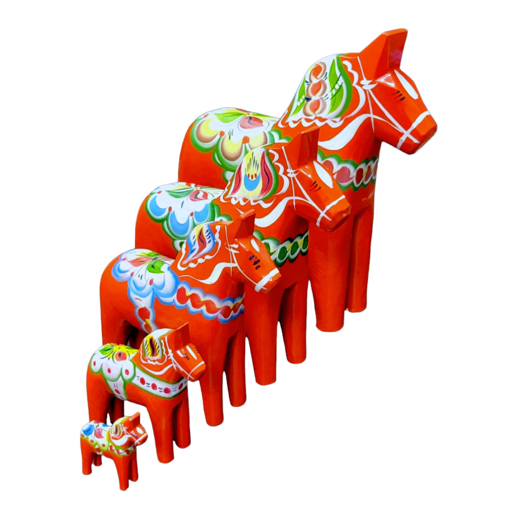 A set of seven nested, hand-painted red Dala horses crafted from pine wood, arranged in a diagonal line to showcase the artistry of Swedish craftsmanship.