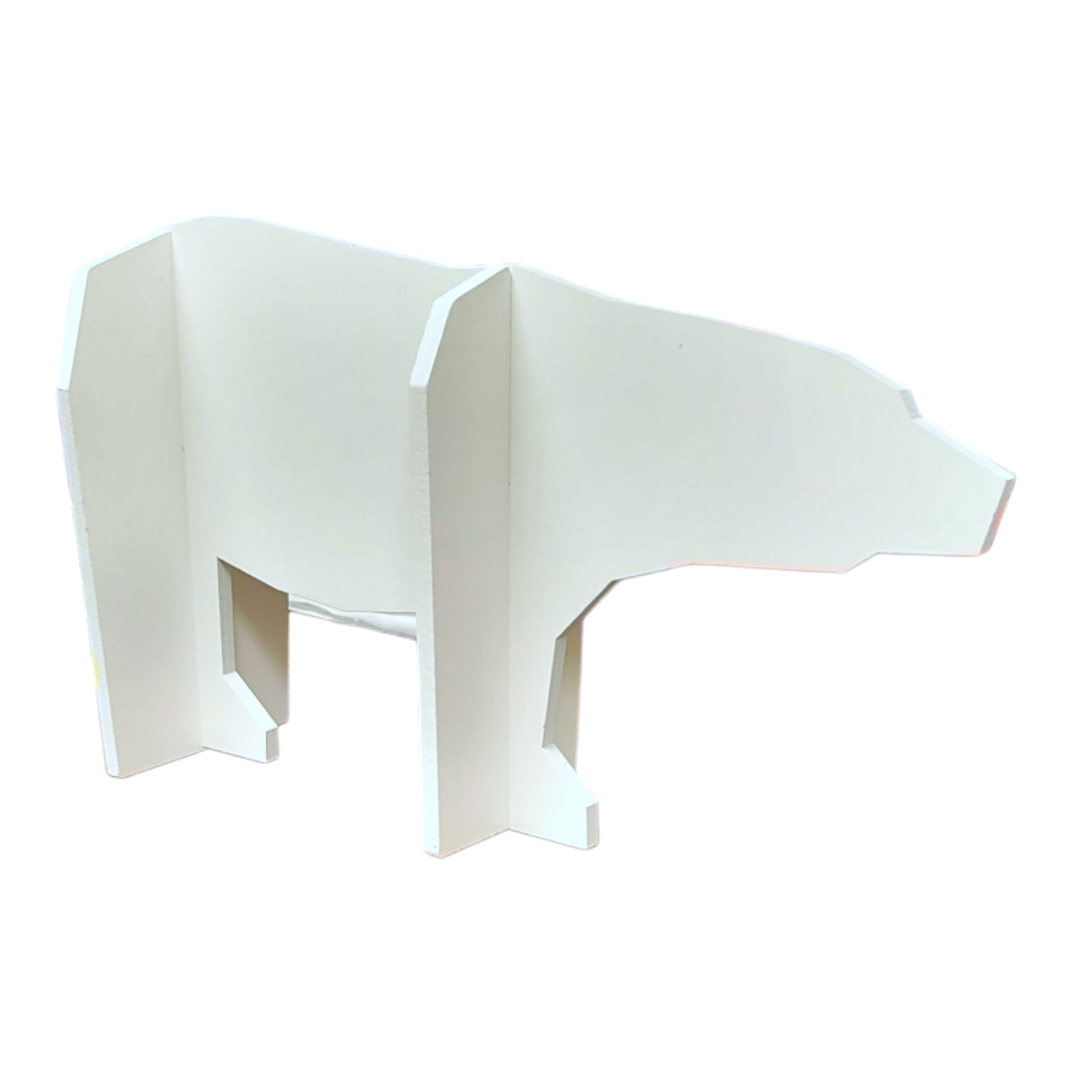 This bookend, resembling Jagar the Polar Bear from The Polar Bear Wish Book, is crafted from flat panels in a bear shape.