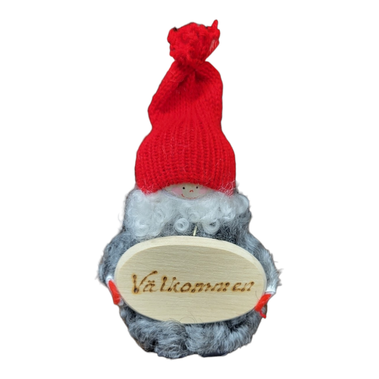The Tomte with Valkommen Sign figurine features a gnome in a red knit hat and gray beard, holding a handcrafted wooden sign engraved with "Välkommen," capturing the charming spirit of Sweden.
