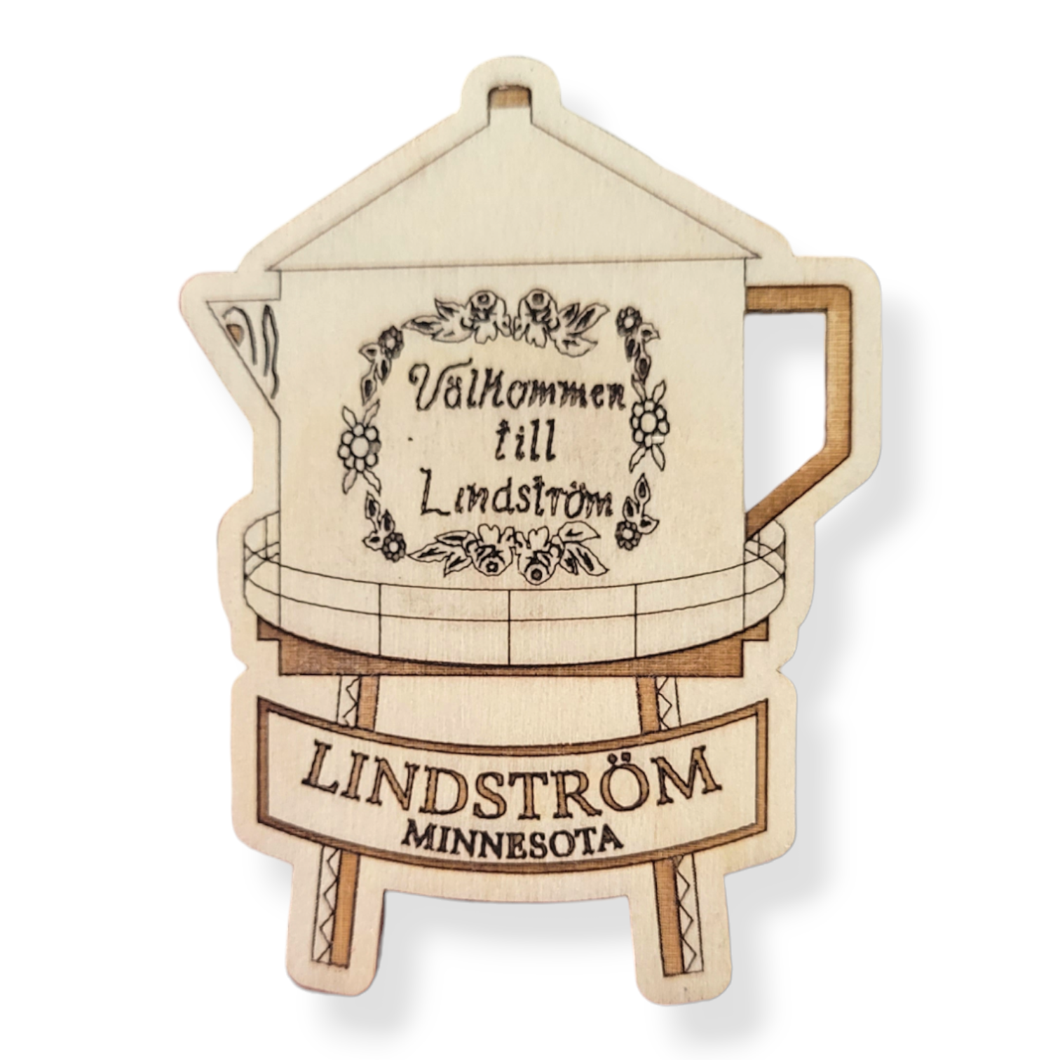 Wooden magnet etched with a design of the Lindstrom Water Tower, showcasing the text "Välkommen till Lindström" and "Lindström, Minnesota.