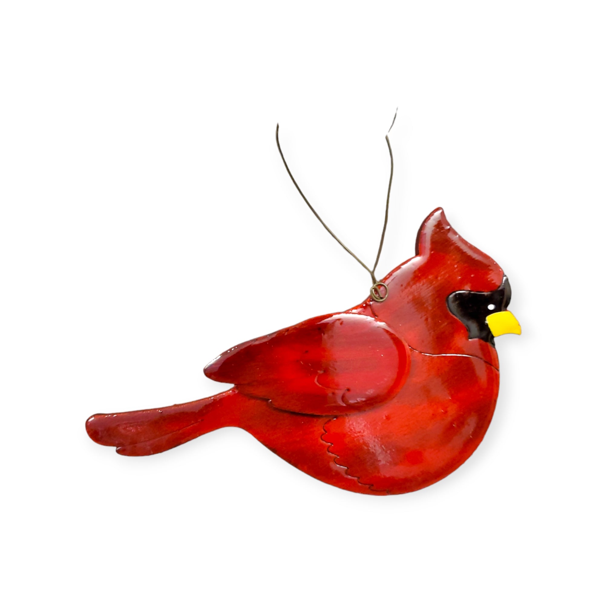 The Polished Cardinal Ornaments, meticulously crafted from metal with intricate detailing, serve as standout decorations for your Christmas tree. These ornaments feature a sturdy wire hanger for easy display alongside your cherished wood ornaments.