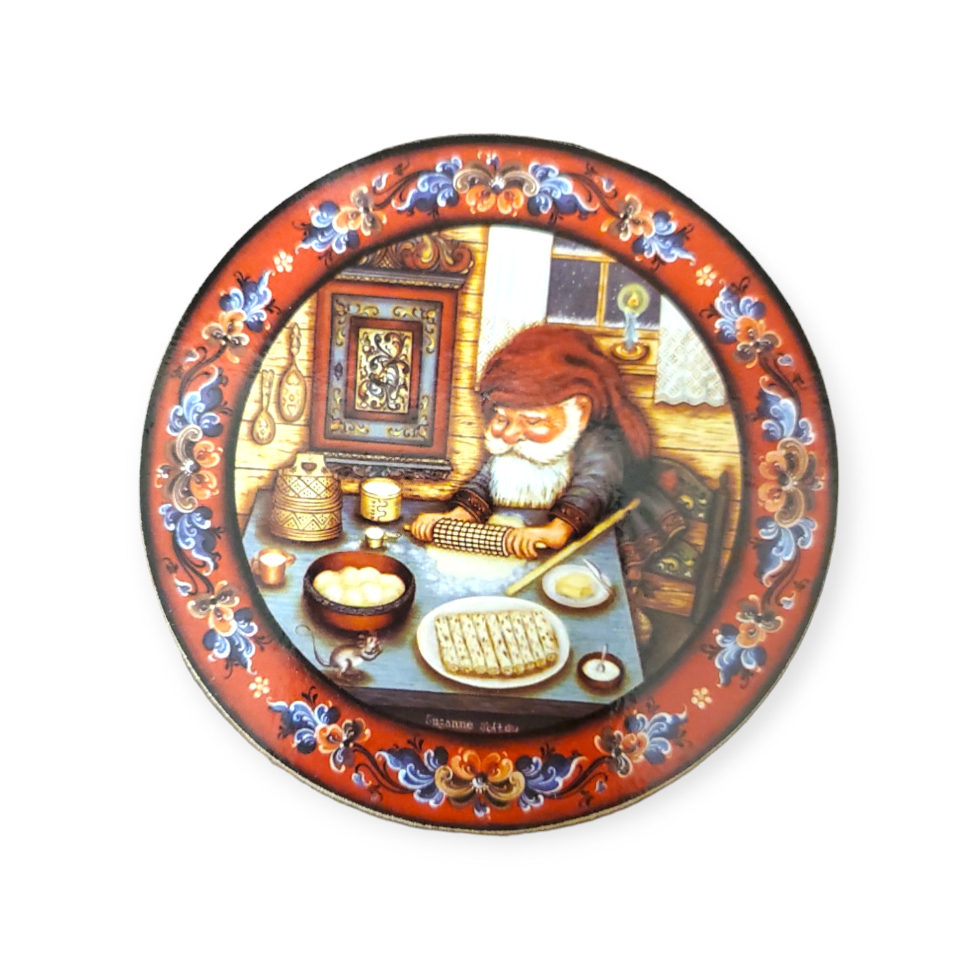 Coaster set featuring a charming Tomte character making waffles in a cozy kitchen, with colorful patterns that evoke a warm sense of Julestemning.