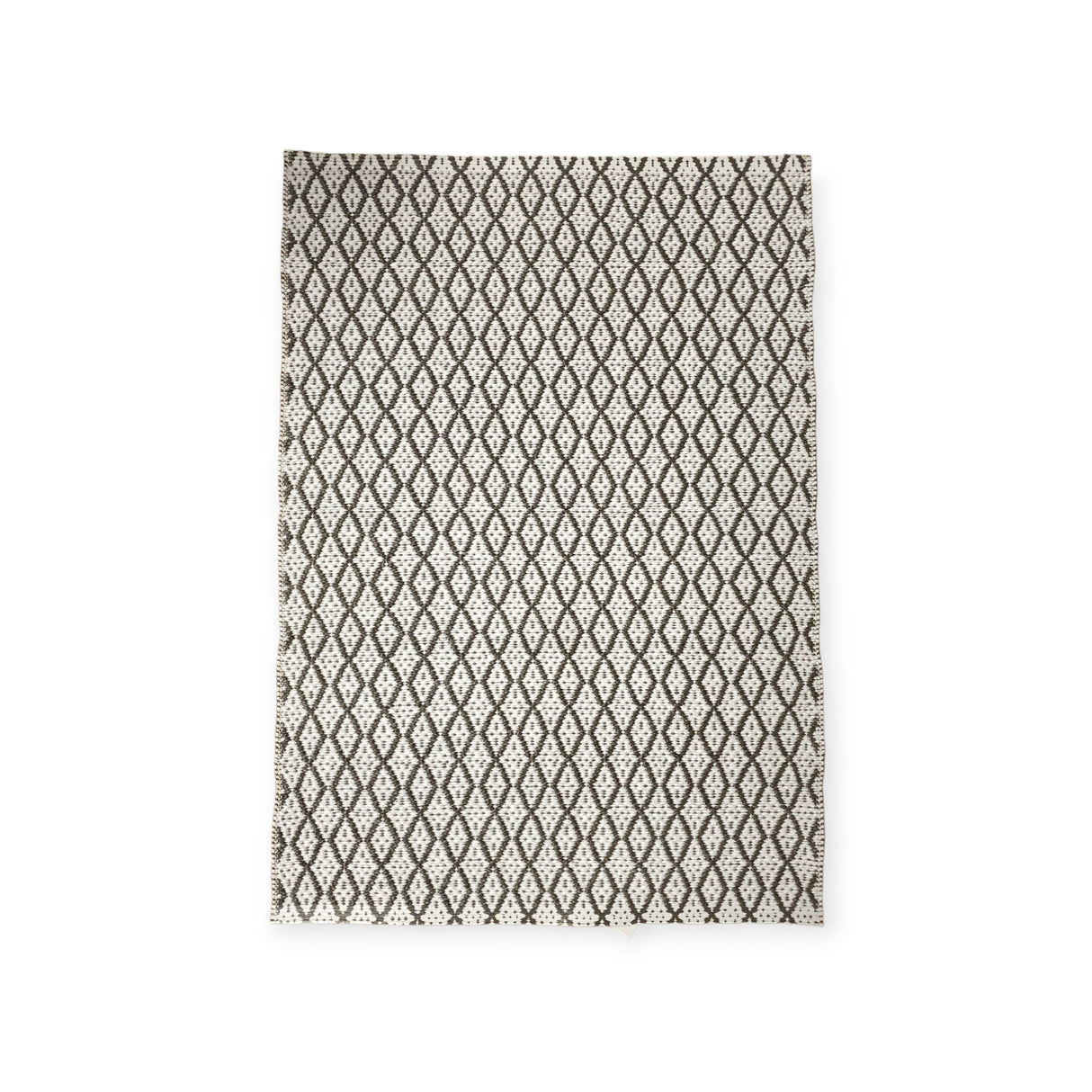 The Eye Grey 70x100cm Swedish Vinyl Rug combines style and function with its black diamond pattern on a white background. This durable, long-lasting rug is also non-skid reversible, ensuring safety and versatility for any room.
