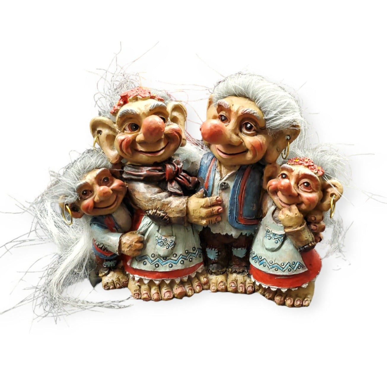 A delightful set of four Norwegian troll dolls, made from resin with white hair and traditional attire, captures the essence of collectable charm.