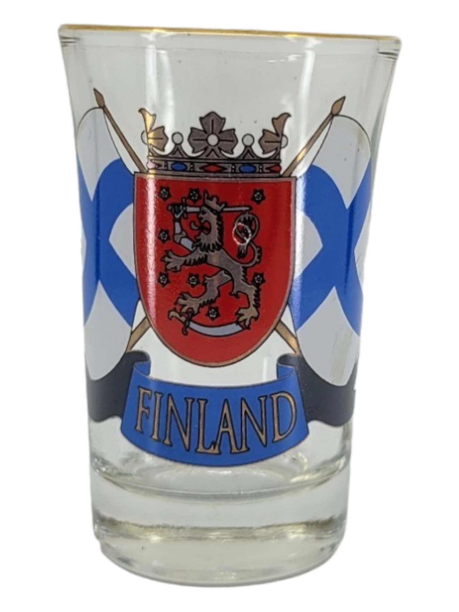 The Finland Shot Glass features the coat of arms with a lion on a red shield, enhanced by blue and white elements that reflect the Finnish flag, celebrating Finlands rich culture.