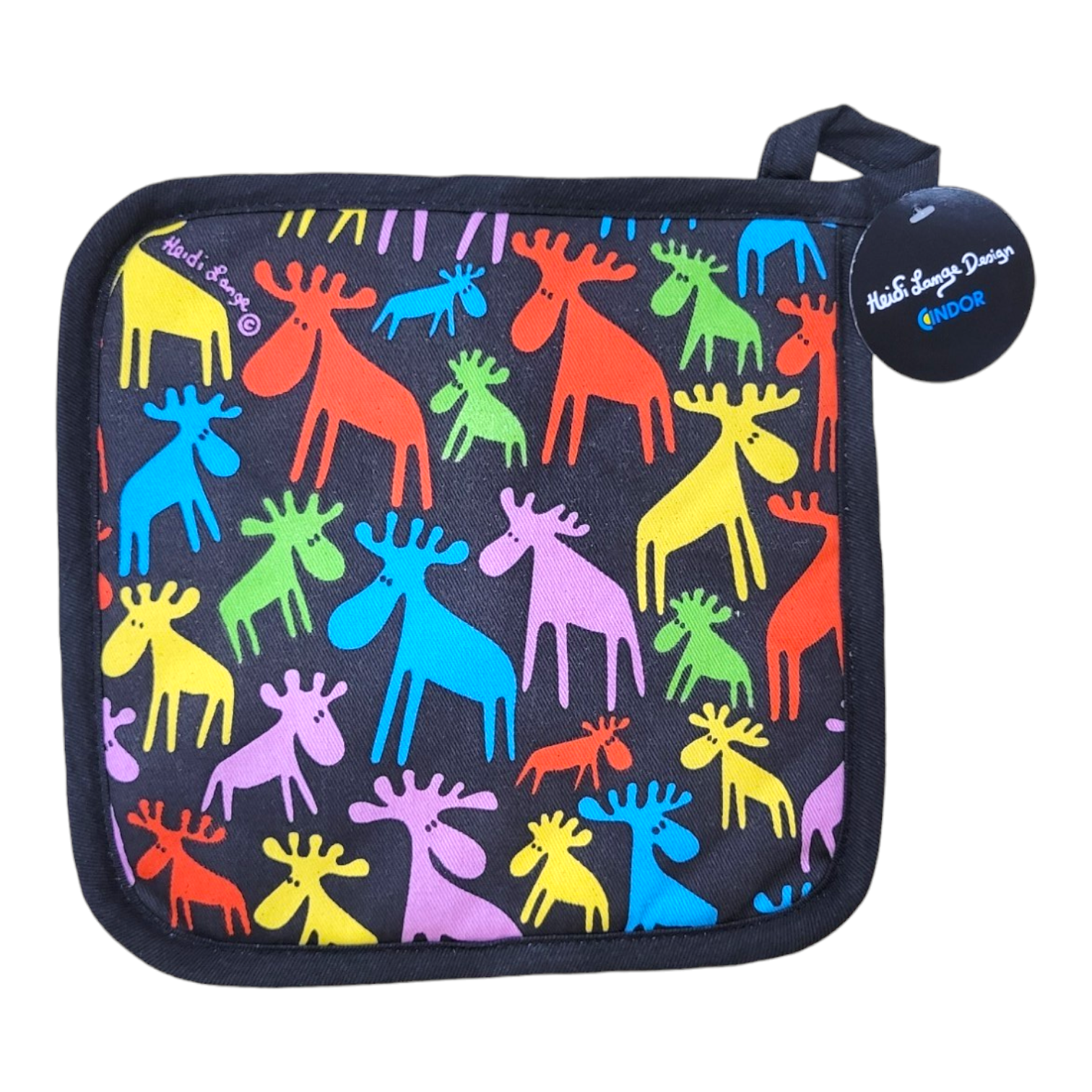 A cotton potholder, "Moose Print on Black with Multi-Color Moose" by Swedish artist Heidi Lange, features colorful moose silhouettes and a tag in the top right corner.