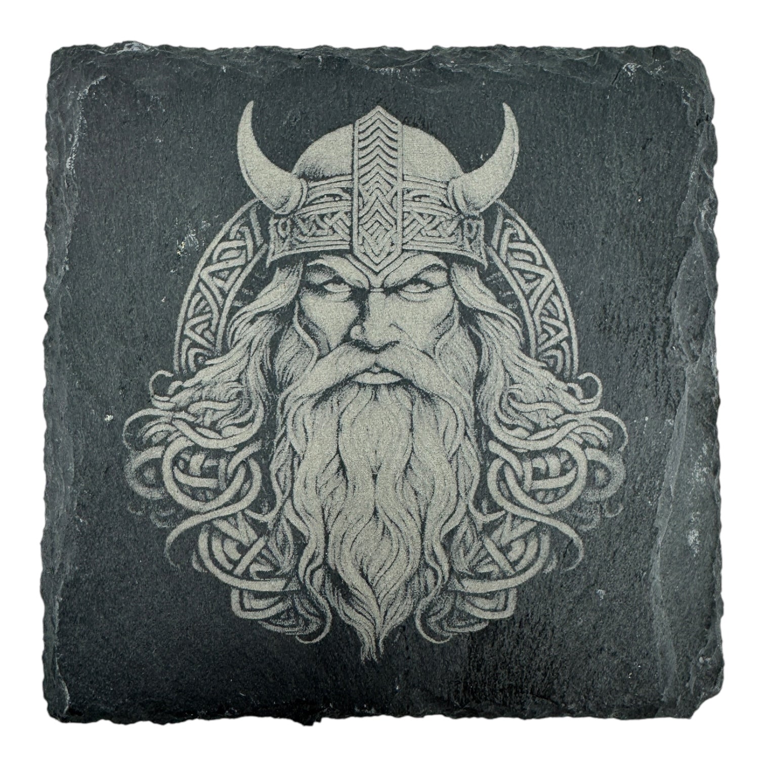 Engraved image of a Viking warrior with horned helmet and beard on a square slate coaster. The design, from the Coaster: Warrior, Viking Head - Celtic Viking Symbol Slate Coaster, is inspired by Norse mythology and Celtic Viking symbols.