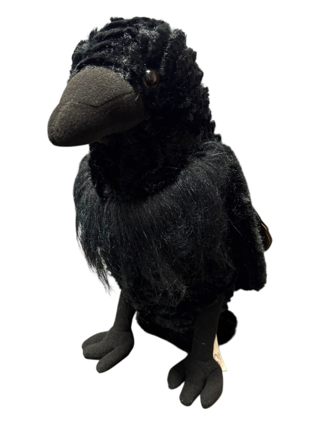 The Plush: Raven Wild Onez Raven Stuffed Stands Animal 12 Tall features a textured body, black beak, and button eyes. This upright black plush makes a perfect Viking companion or collectors piece, inspired by Norse lore.