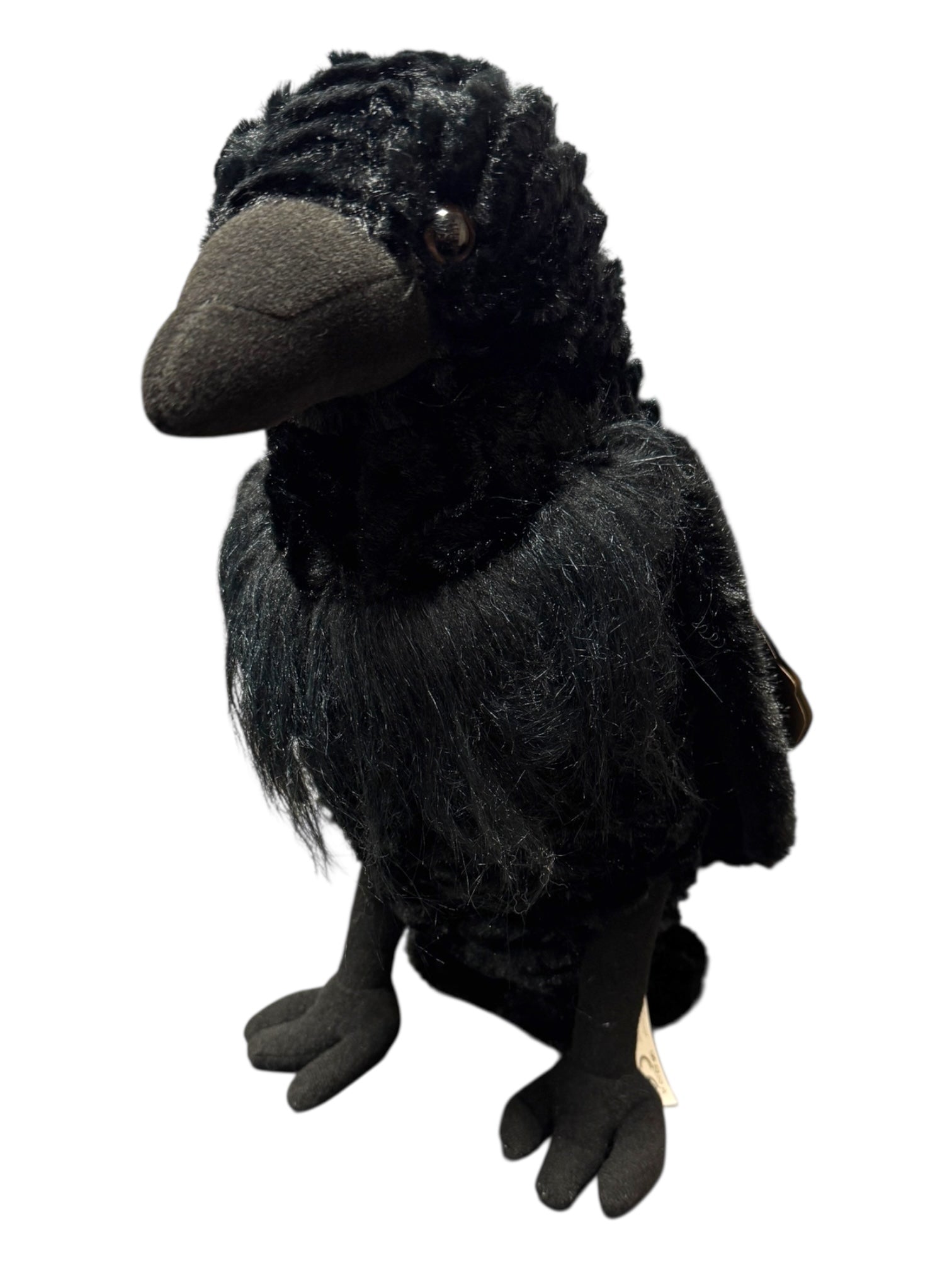 The Plush: Raven Wild Onez Raven Stuffed Stands Animal 12 Tall features a textured body, black beak, and button eyes. This upright black plush makes a perfect Viking companion or collectors piece, inspired by Norse lore.