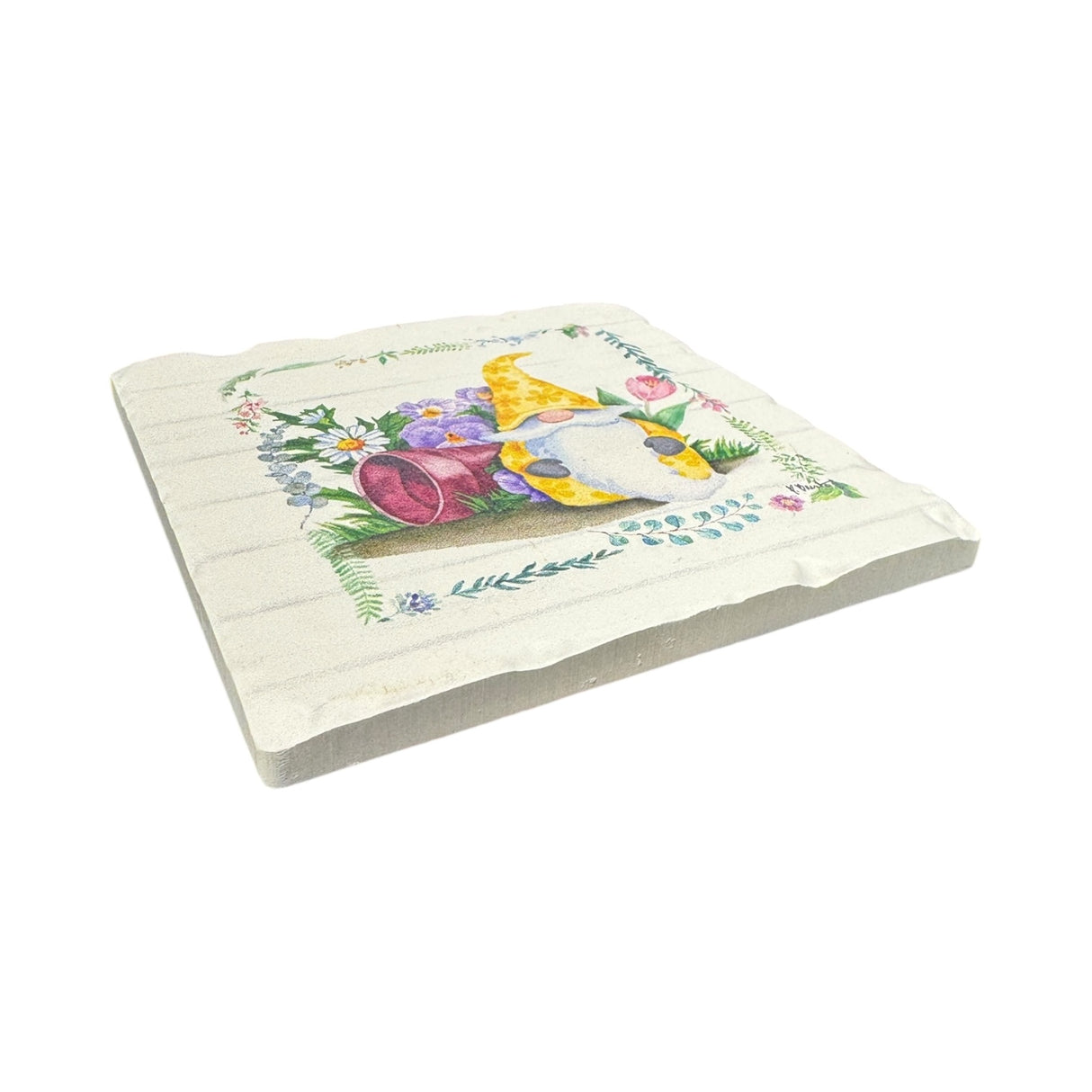 The Coaster: Spring Tomte - Gnomes Tumbled Tile Coaster Set includes four 4" square ceramic coasters with a gnome in a yellow hat amid flowers on white, plus cork backing for surface protection.