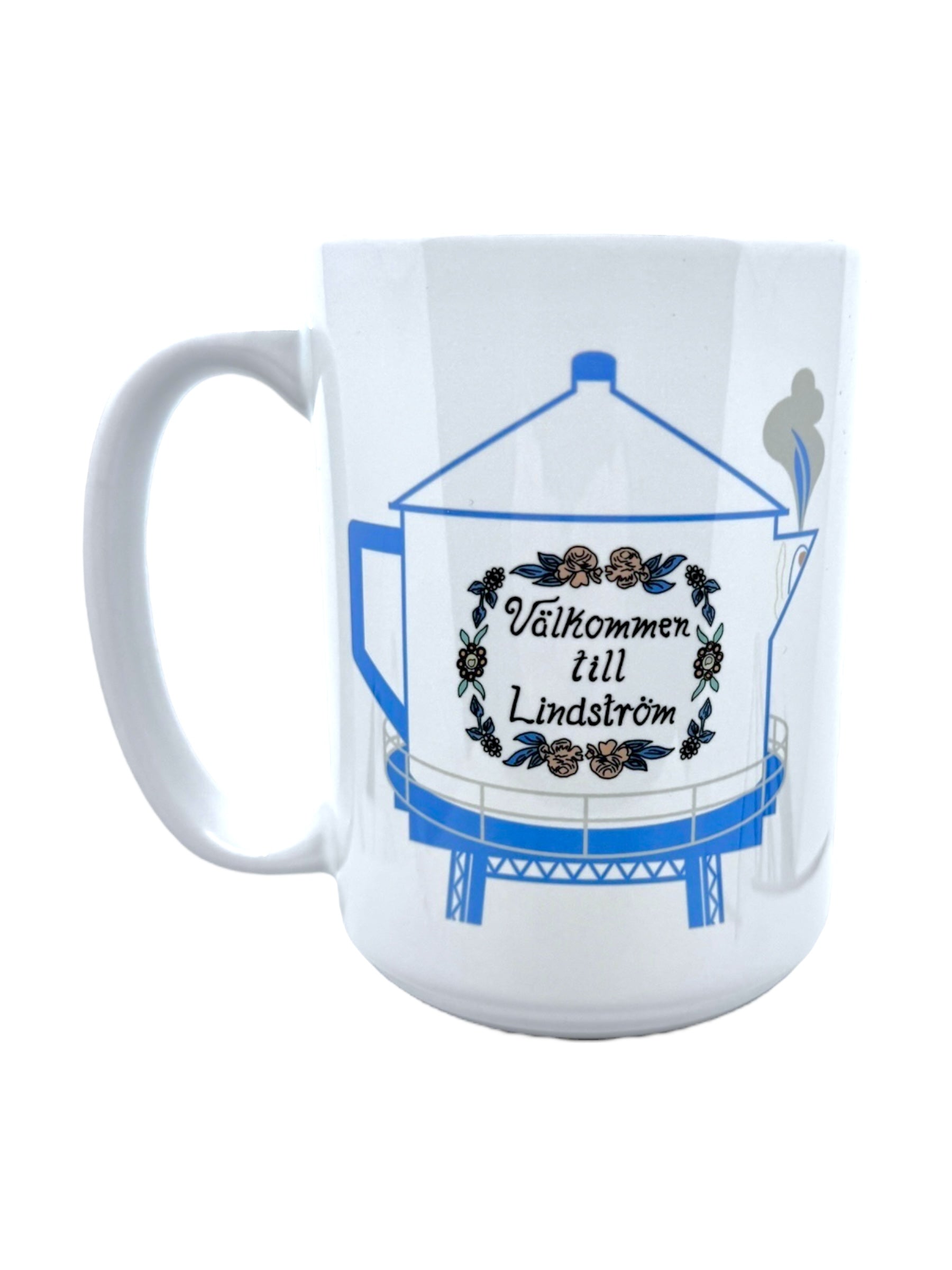 Enjoy every sip with this 15oz white ceramic mug, featuring a blue Swedish coffee pot water tower illustration, floral wreath, and Välkommen till Lindström text—perfect for celebrating America’s Little Sweden.