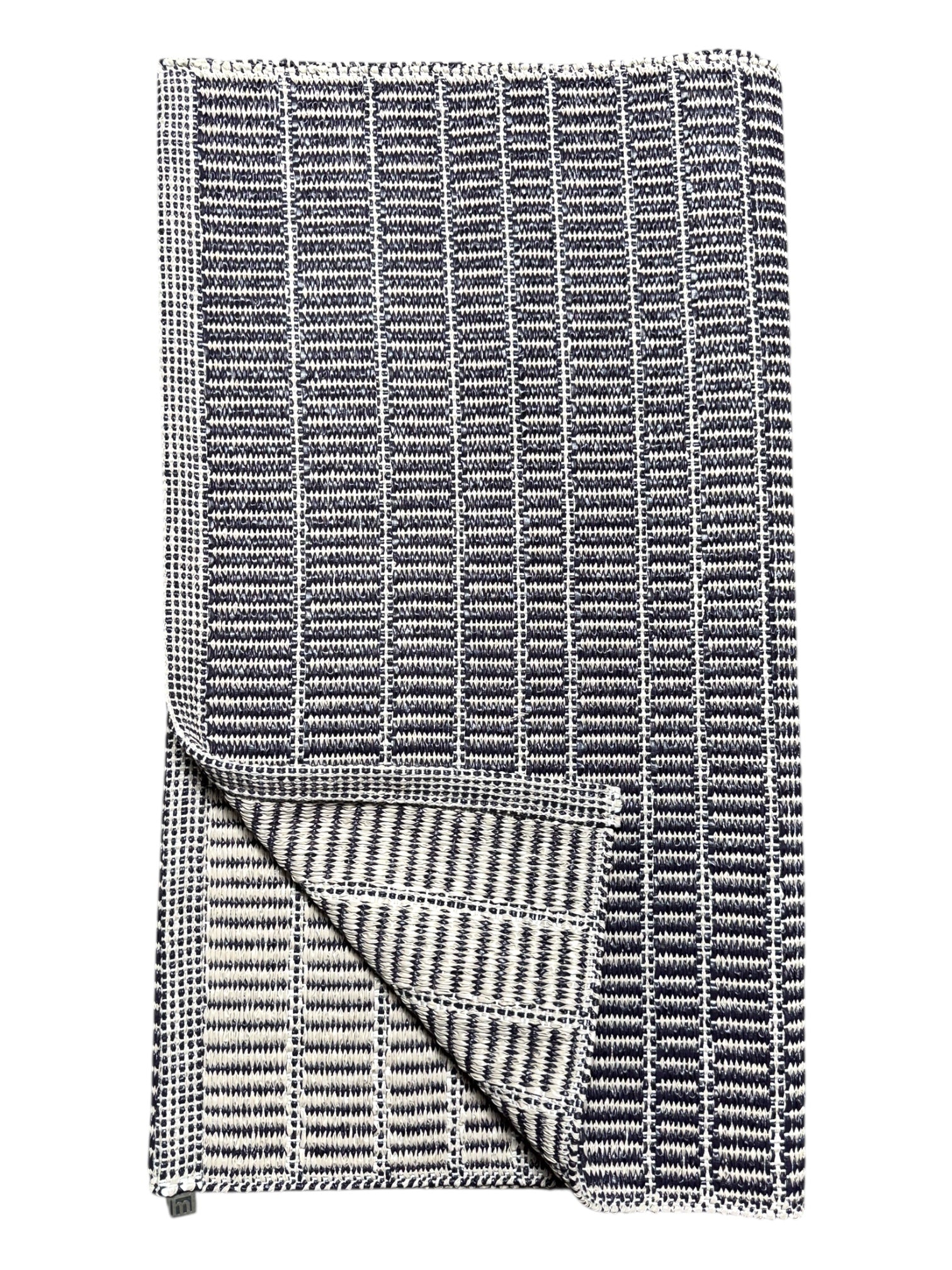 Folded Vinyl Rug: Horredsmattan - Mai (28 x 60) in black and white with a grid pattern, displaying both front and reverse sides.