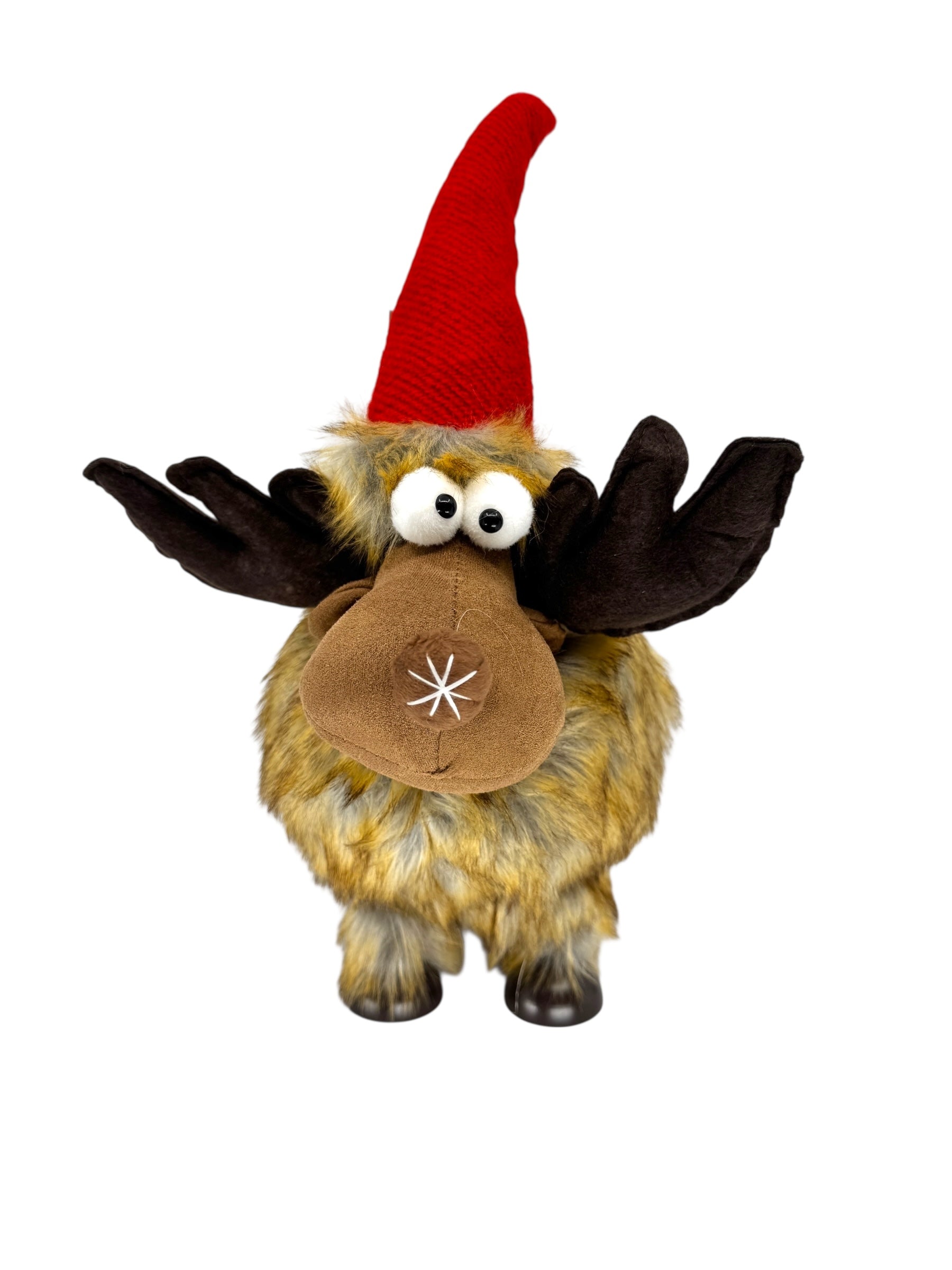 The Decor: Shaky Moose Holiday Table Decoration stands 16 tall with brown fur, large antlers, wide eyes, and a poseable red hat—perfect for Scandinavian-inspired décor or as a charming holiday table accent.