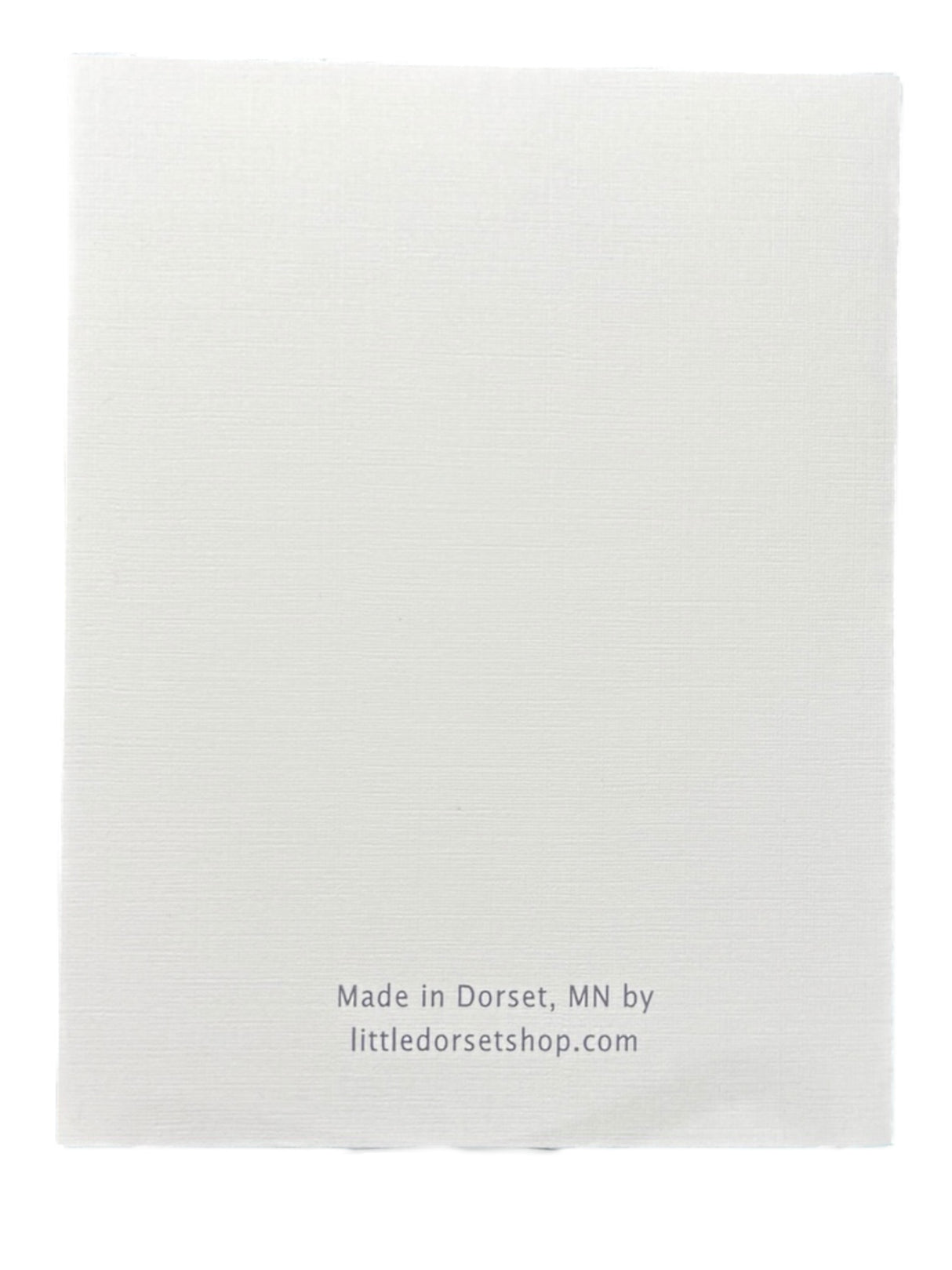 A plain white rectangular card, Card: Hope Your Birthday is Legendary with Bigfoot & Paul Bunyan Birthday Card, with Made in Dorset, MN by littledorsetshop.com in small gray letters at the bottom—perfect for a legendary birthday greeting.