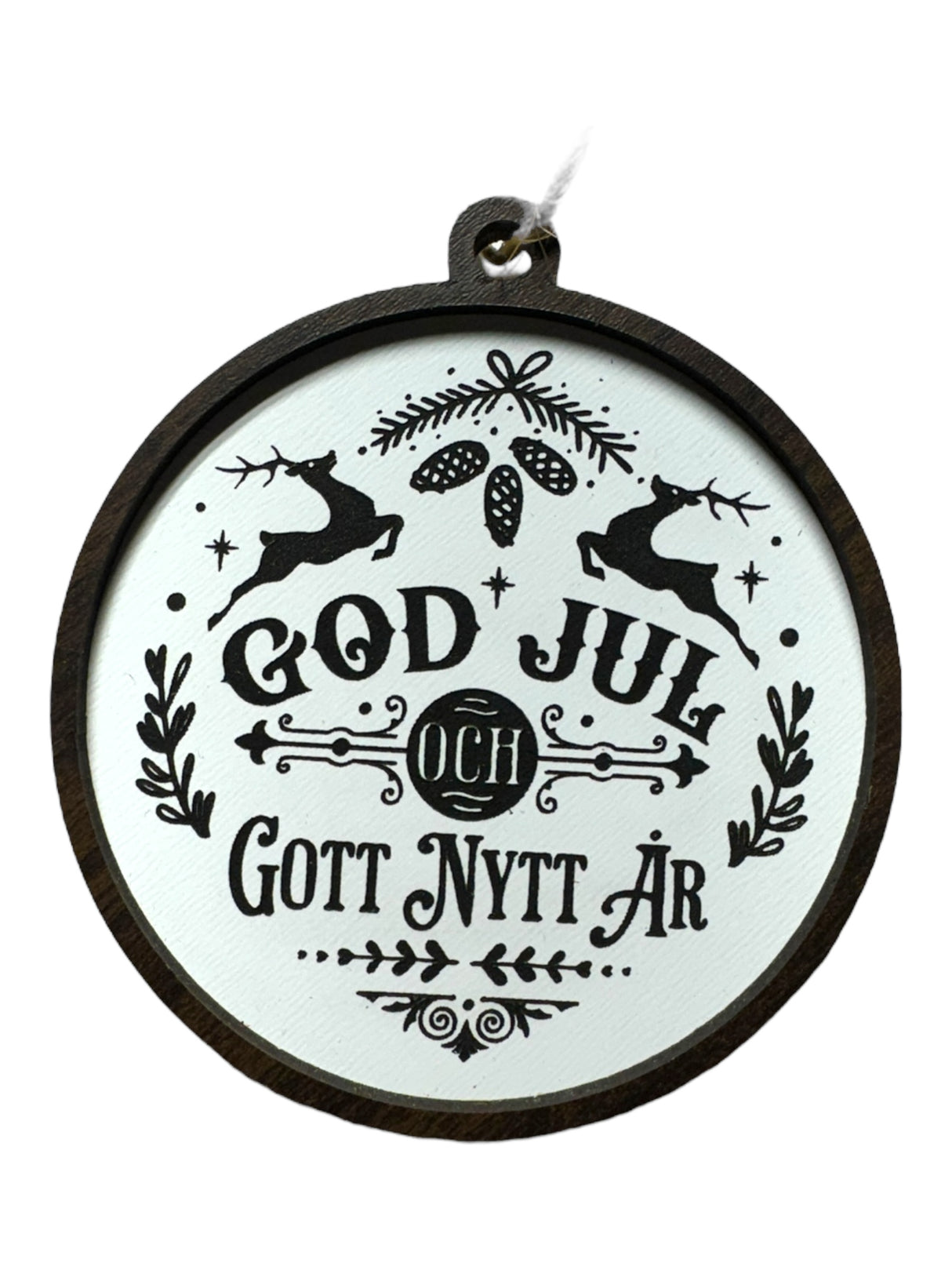 God Jul White & Gott Nytt År ornament features black holiday text with reindeer, pinecones, and foliage on white; hangs by a string—a festive way to celebrate Swedish Christmas traditions.