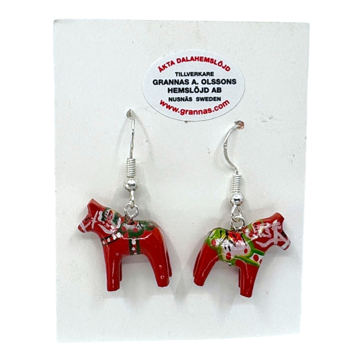 These Earrings: Dala Horse Red Earrings – Handcrafted Swedish Folk Art (2cm / 0.75 High) are a vibrant pair displayed on a maker-labeled card—ideal for those who love unique, artisan jewelry and Swedish folk tradition.