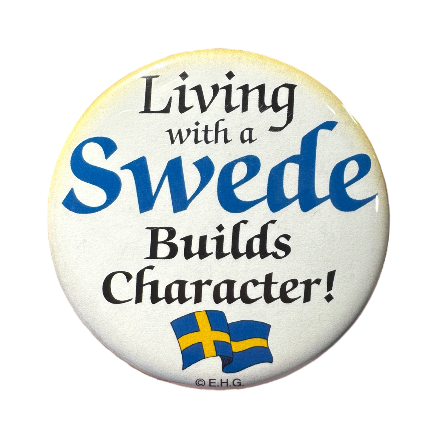 The Magnet: Living with a Swede Builds Character! With the Swedish Flag Refrigerator Magnet showcases the phrase and small Swedish flags, making it a perfect tribute to your Swedish heritage.