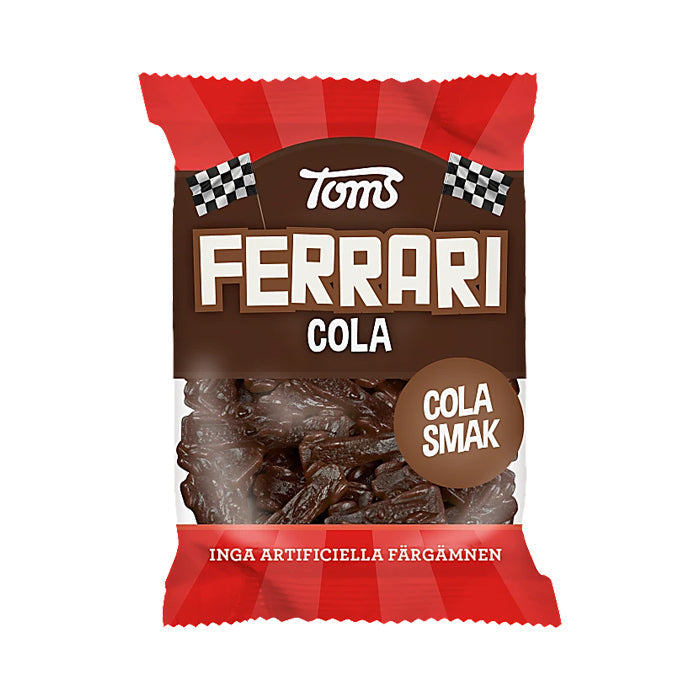 A 120g package of Toms Ferrari Cola candy, featuring a brown, red, and white design, with chewy gummy candies in classic cola flavor and no artificial coloring.