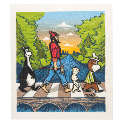 A cartoon of four anthropomorphic characters, reminiscent of the Abbey Road album cover, walks across a bridge in a forest. They carry eco-friendly cleaning tools, with one showcasing the MN Abbey Road Swedish Dish Cloth by Adam Turman, famous for its super absorbency.