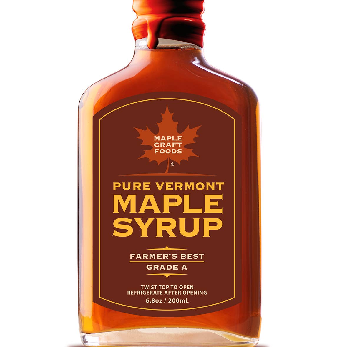 A 6.8 oz glass bottle of Maple Syrup - Pure Vermont Maple Syrup Farmer's Best, featuring a maple leaf logo and rich amber syrup inside.