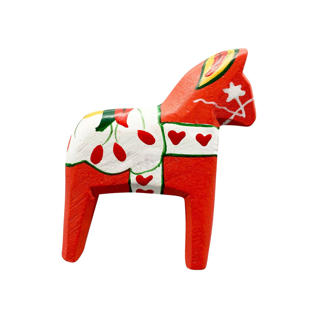 Standing on a white background, the Magnet: Red Swedish Dala Horse Refrigerator Magnet (3" tall by 2.5" long) from European Heritage Gifts features iconic white, green, and yellow painted patterns—including hearts and floral motifs—making it a charming Scandinavian souvenir.