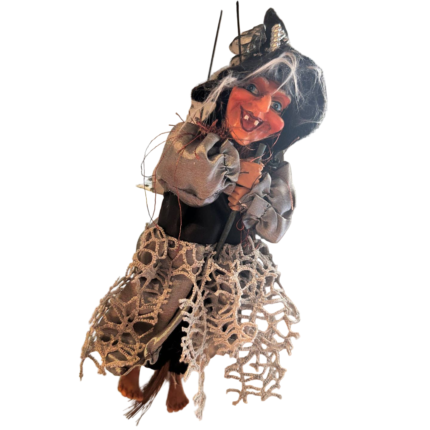 The Figurine: Kitchen Witch Doll – Sirene Silver (10.2" Tall) features Northern European folklore inspiration, a pointed black hat, silver clothing, wild white hair, and is shown suspended by visible strings against a white background.
