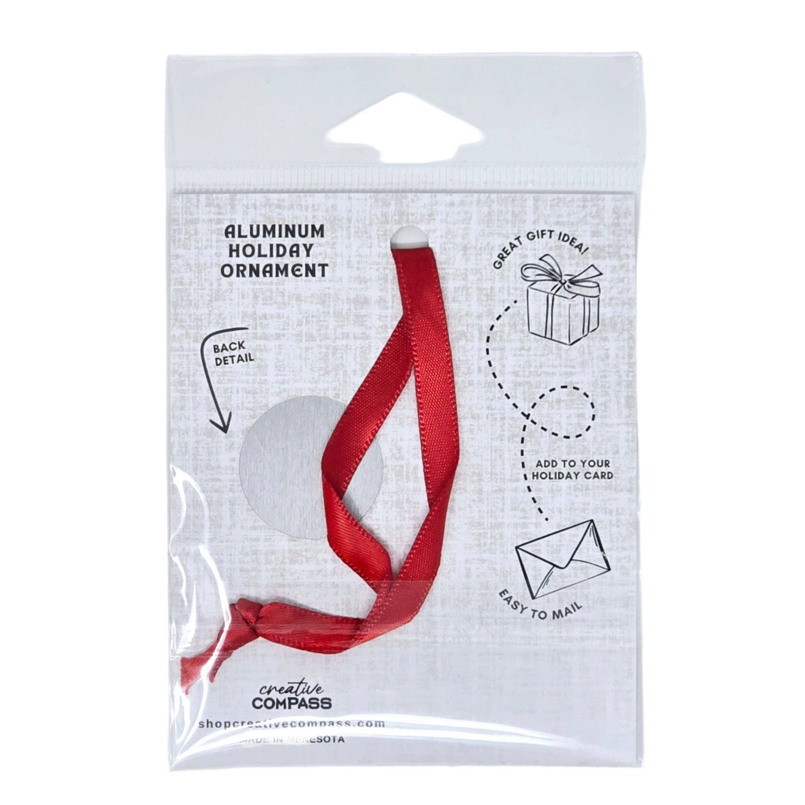 The Ornament: Nordic Love Metal Ornament designed by Cindy Lindgren is a beautifully packaged Scandinavian aluminum piece featuring a red ribbon, ideal for infusing your Christmas tree with Nordic charm. The package includes gift-giving ideas and convenient mailing options.