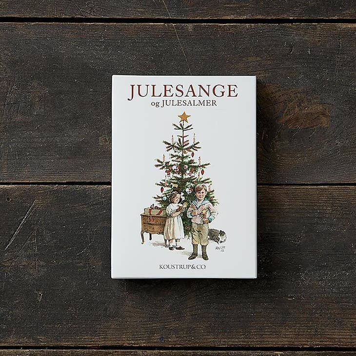 Card Pack: Julesange og Julesalmer "Christmas Carols" by Koustrup & Co includes 8 cards featuring different illustrations of Danish Christmas traditions—ideal for anyone who loves carols and festive celebrations. Comes with envelopes.