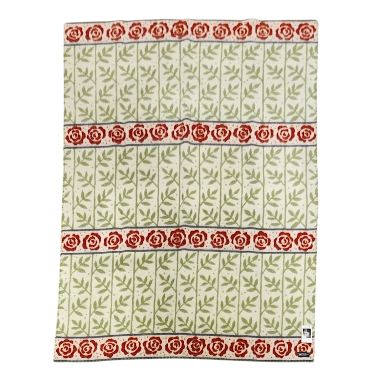 Swedish-style blanket with green leafy vine patterns and three horizontal rows of red roses on a white background.