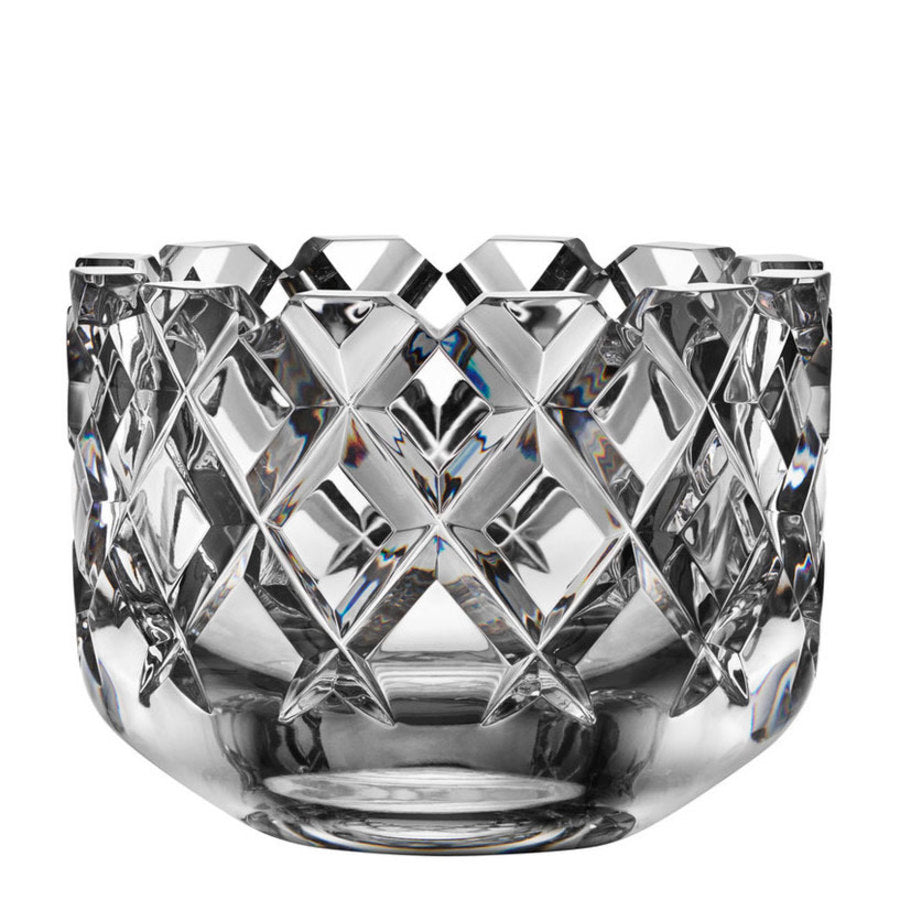 The Orrefors: Sofiero Bowl Medium, a clear bowl with a geometric diamond pattern, beautifully reflects light and is a true Scandinavian classic.