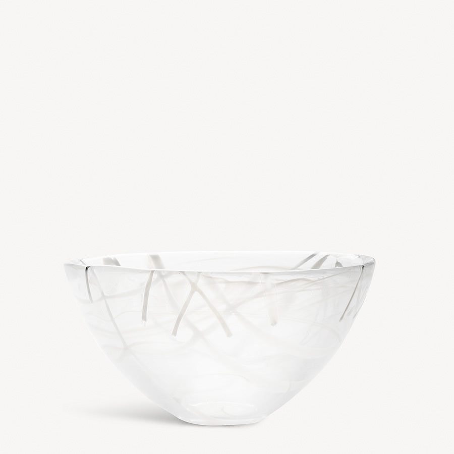 A clear KostaBoda: Contrast Bowl in white with blue and black veining, designed by Anna Ehrner, displayed against a plain light background.