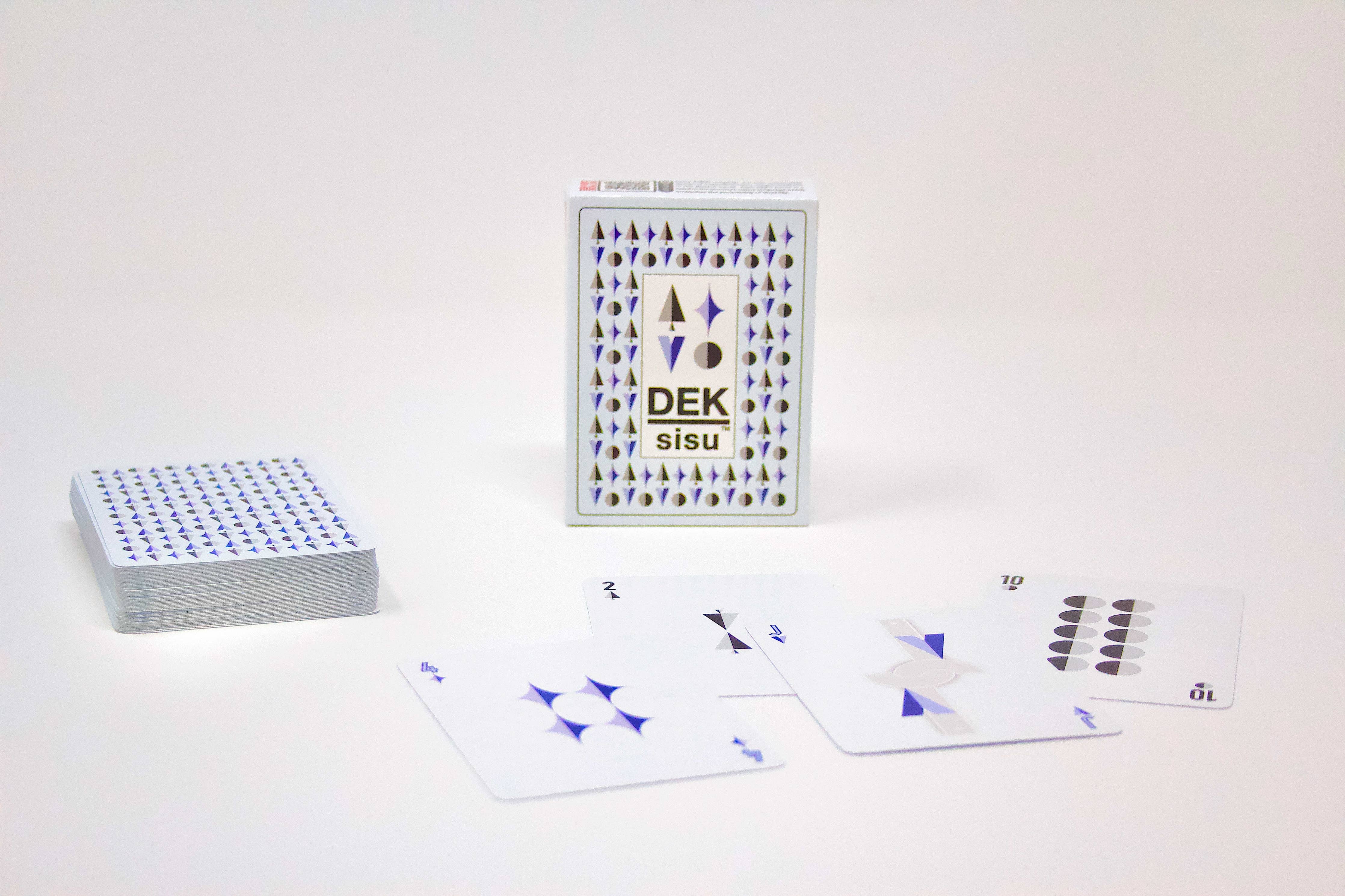 The Playing Cards: DEK Sisu (Finland) features a geometric pattern on the box, beautifully displayed against a white background, representing the Finnish concept of resilience.