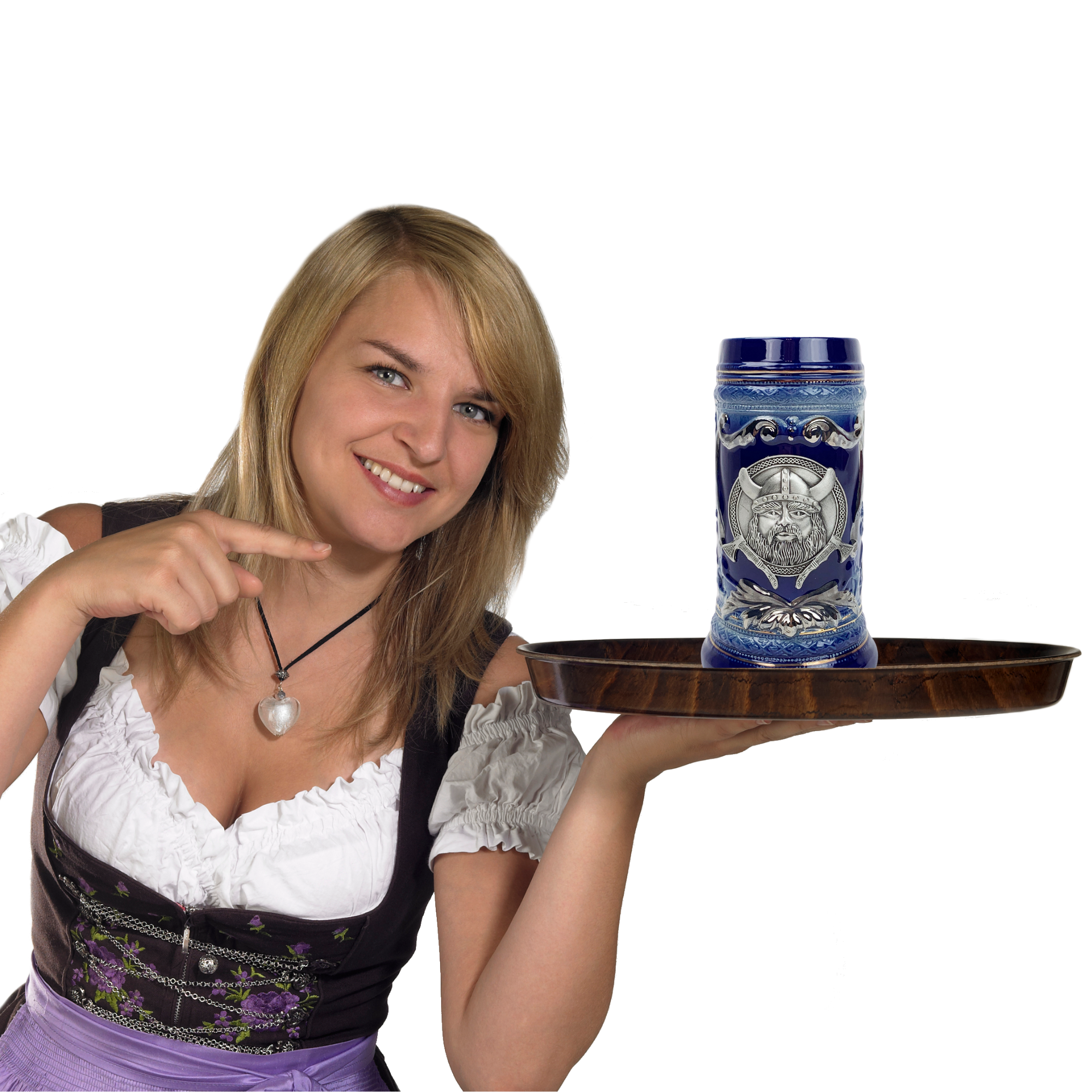 A woman in traditional attire holds a wooden tray showcasing the Beer Stein: Blue Ceramic with Viking Metal Medallion Relief 20oz, proudly pointing at its intricate design and smiling.