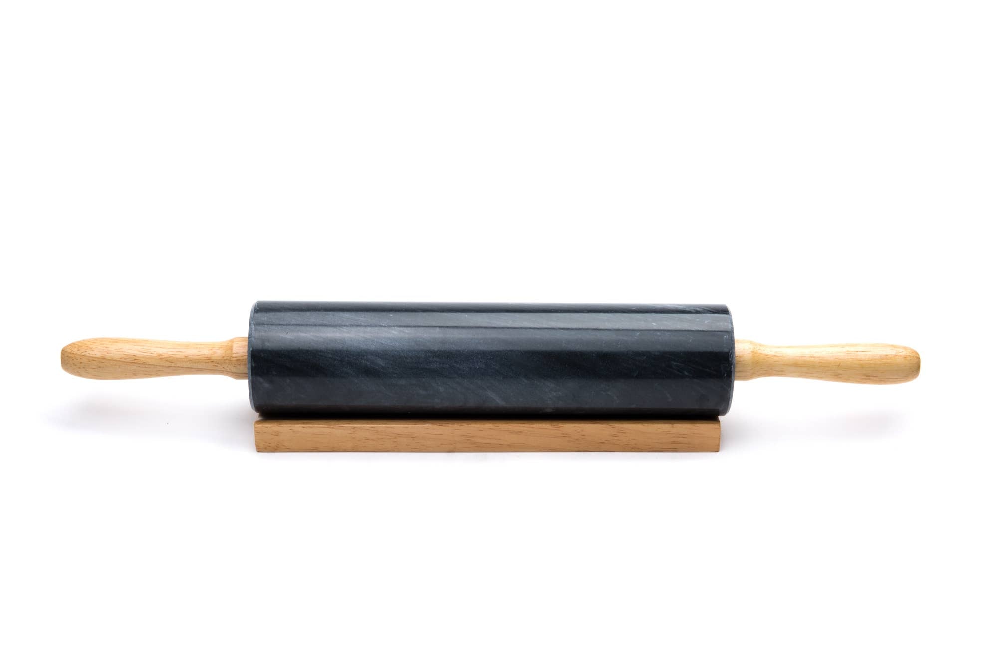 A Marble Rolling Pin, Black with wooden handles is elegantly positioned on a wooden base against a spotless white background.