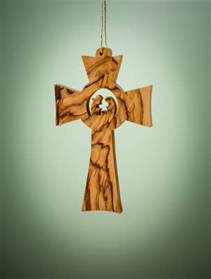 The 3.5" Cross with Holy Family Christmas Tree Ornament features two carved figures in a wooden cross with a central cutout, handcrafted in Bethlehem and suspended by a string against a plain background.