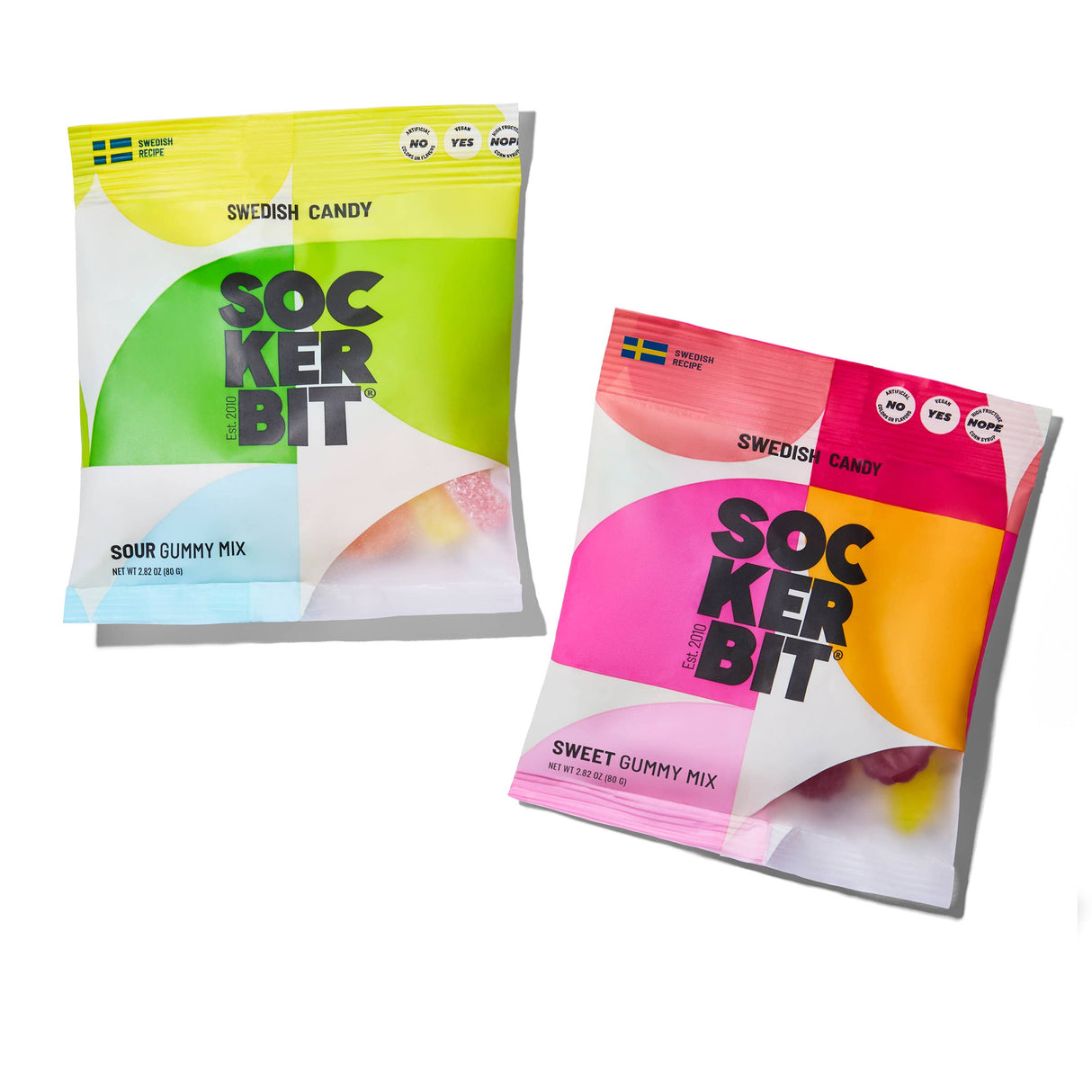 Two Sockerbit Swedish gummy candy bags—one Sour Gummy Mix with green/blue details, the other Sweet Gummy Mix (2.8oz) with orange/pink accents—are shown on a white background. Both are non-GMO and colorful.