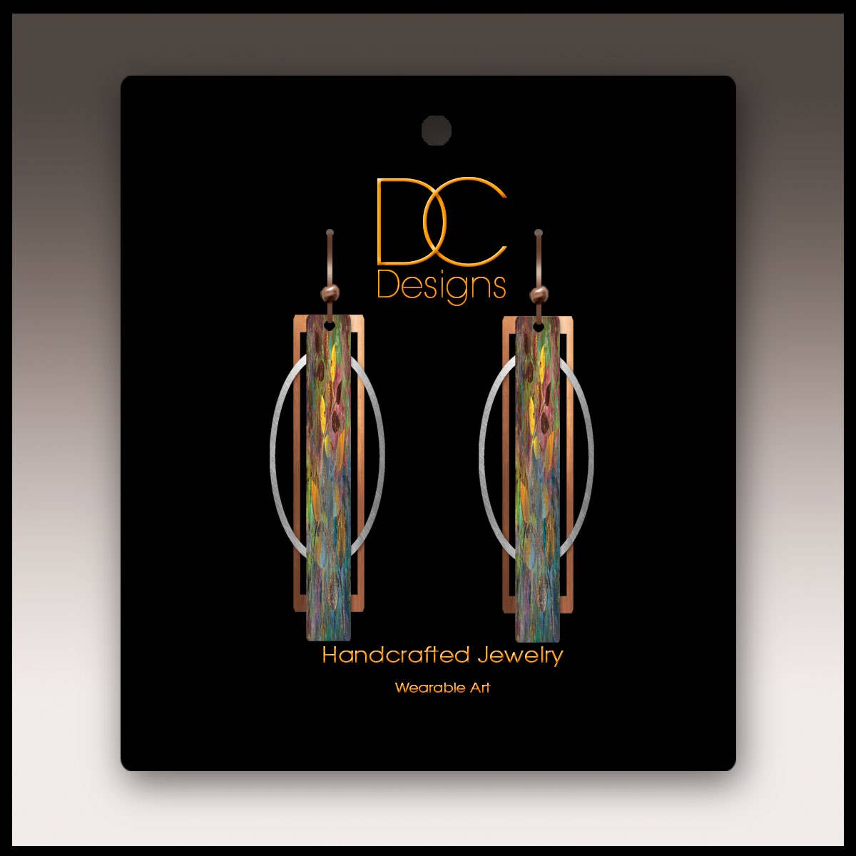 Earrings: Yellow Splash Geometric Multilayer Metal Accent Handmade Earrings—bold, handcrafted multicolored metal earrings with oval and rectangular accents, displayed on black DC Designs packaging for a unique style statement.